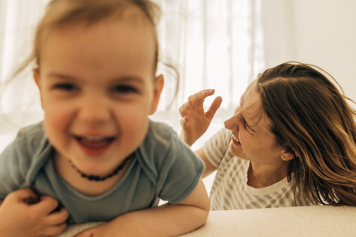 Series of close-up shots capturing candid moments of pure happiness and genuine smiles.