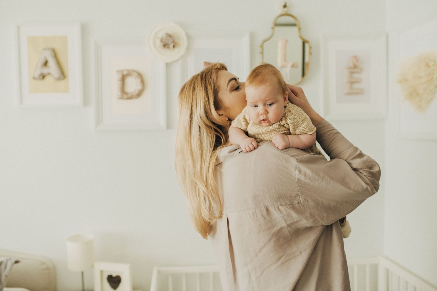Cozy indoor scene with soft natural lighting and wall decorations.