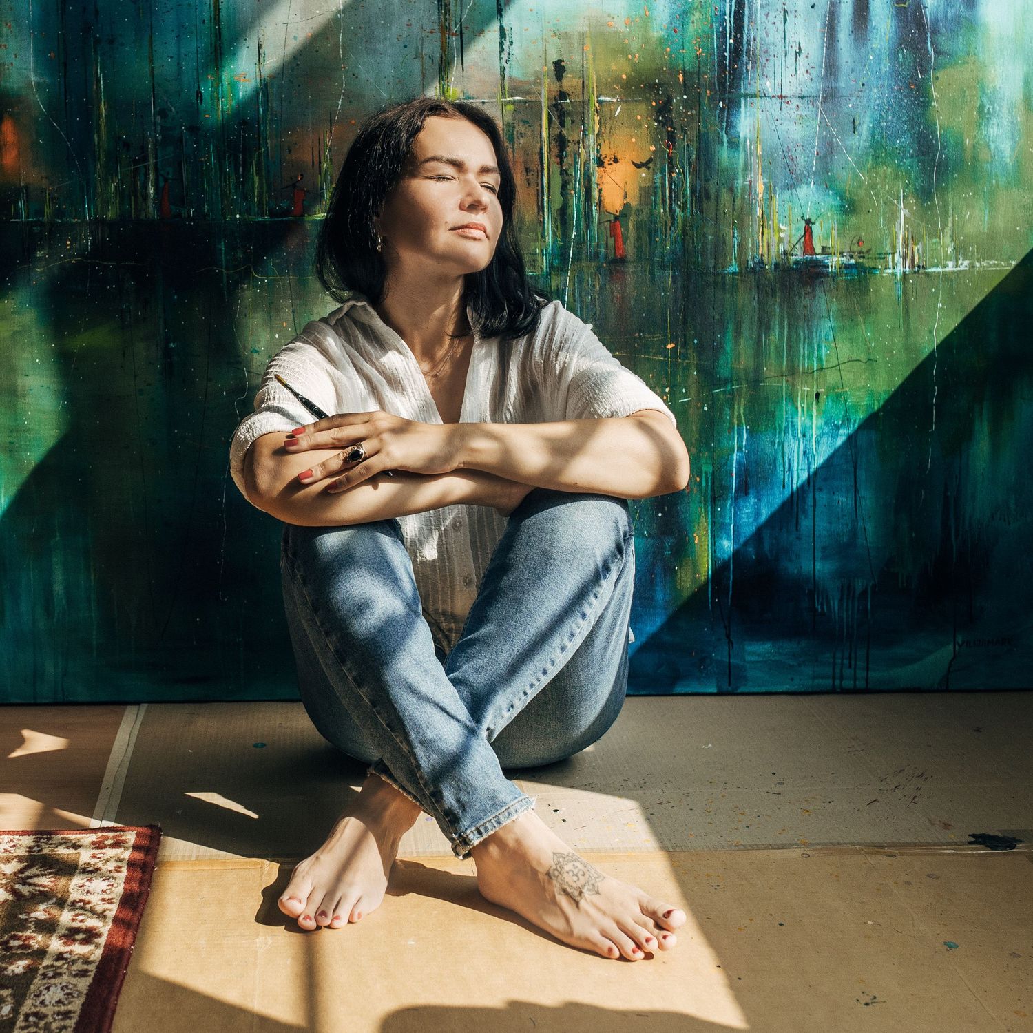Artistic sequence showing sunlight and shadows cast on a wooden floor with a person sitting.