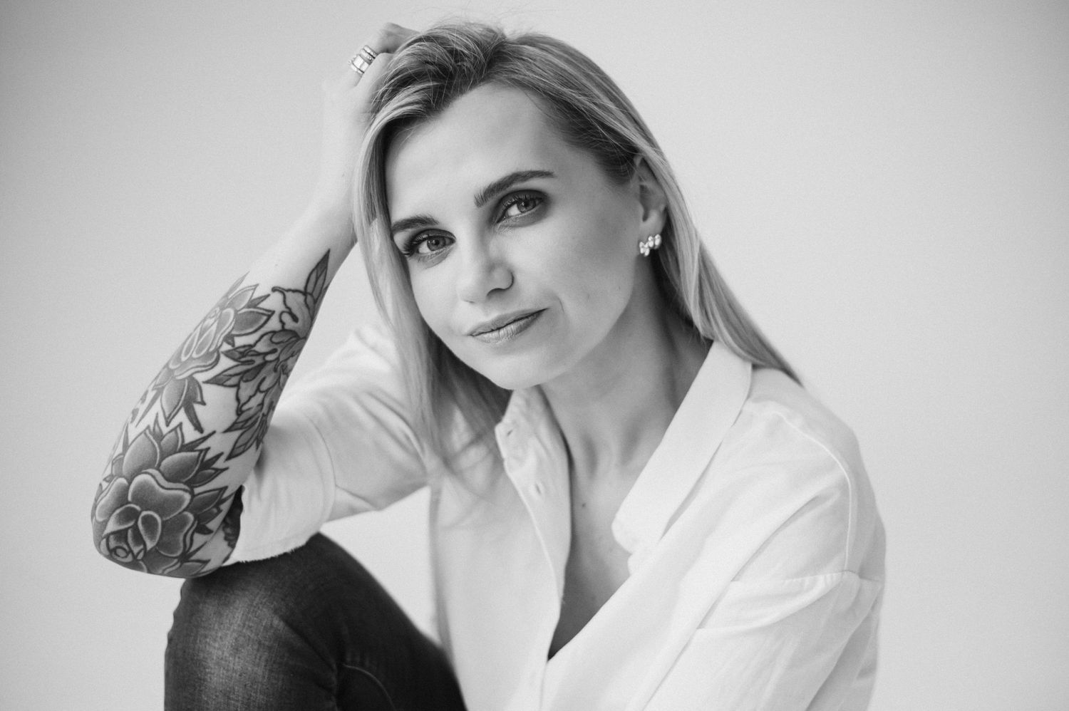Portrait series in black and white featuring person in professional attire.