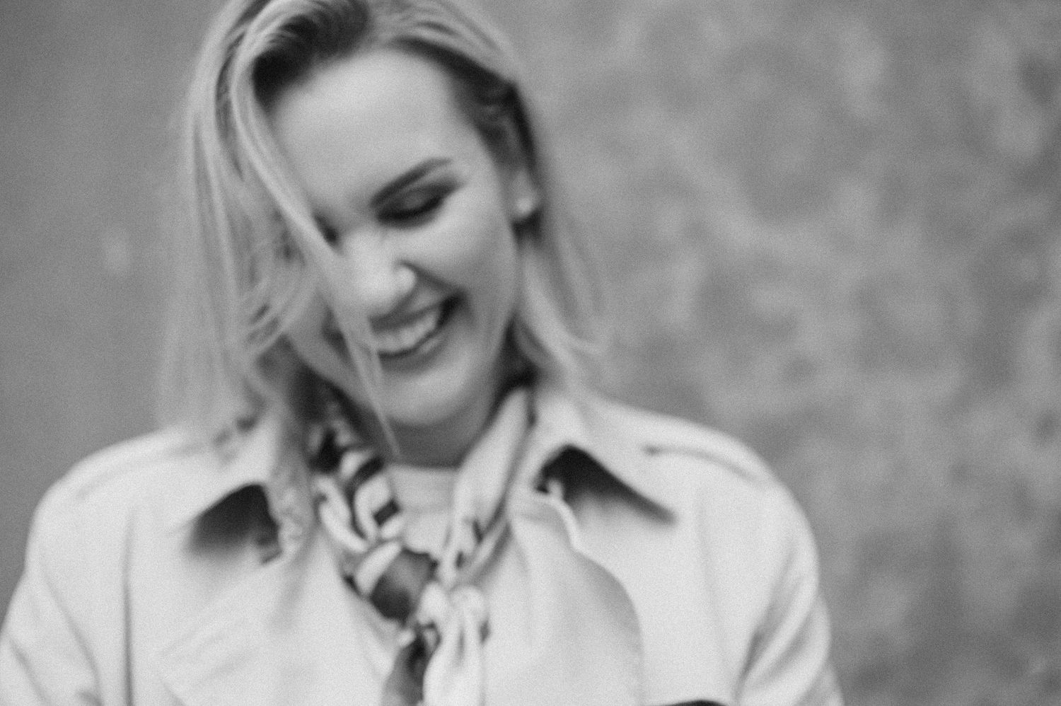 Black and white editorial photoshoot featuring elegant poses and natural expressions.