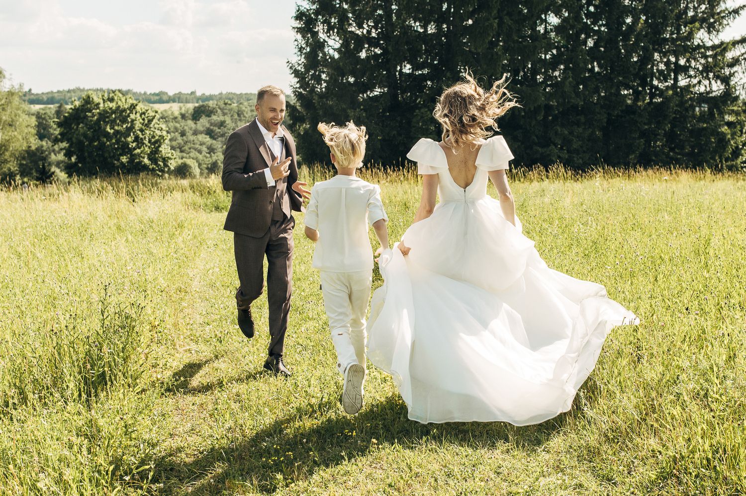 Series of joyful moments captured in sunny meadow with flowing white dress.