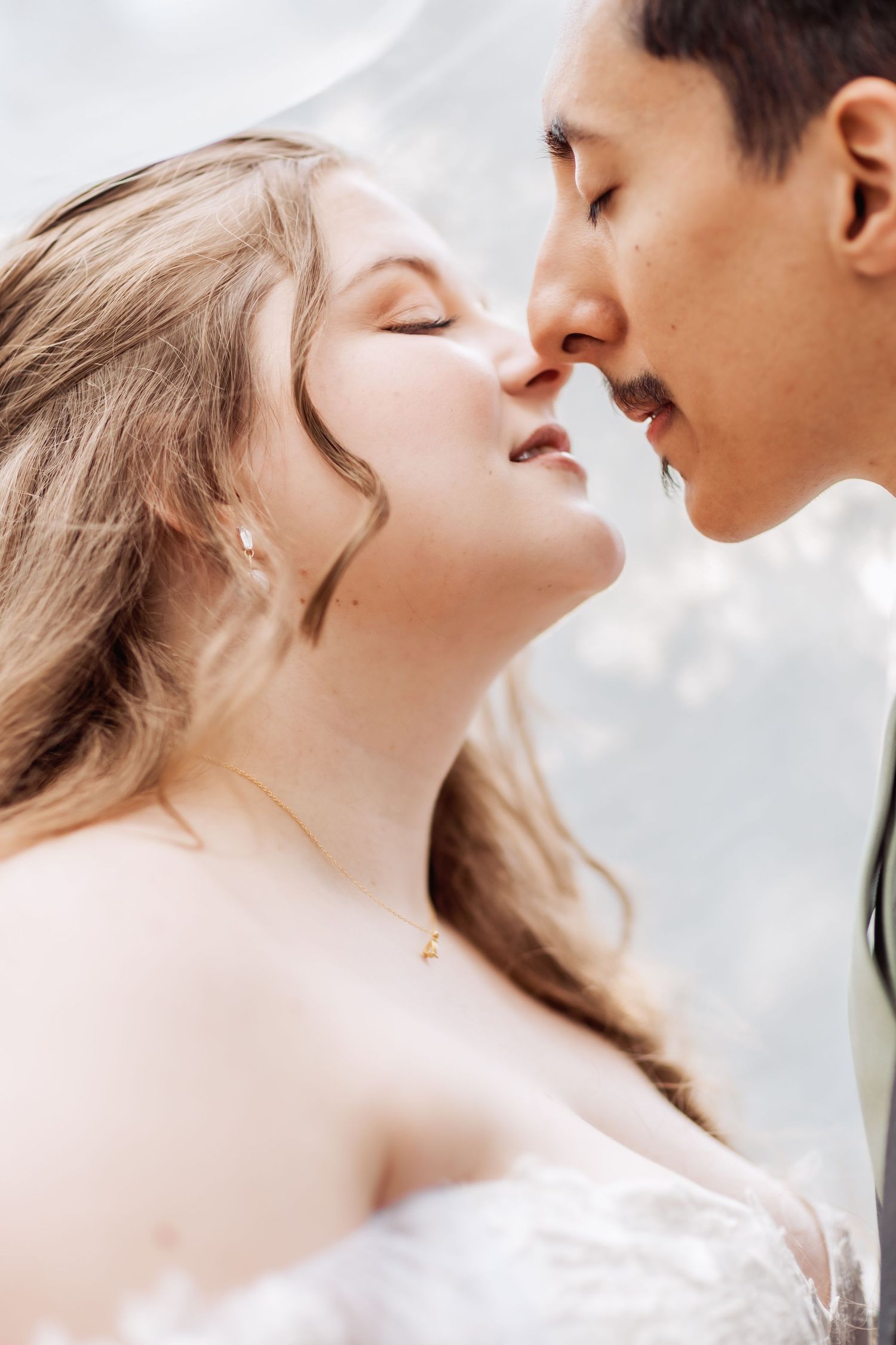 Romantic close-up sequence of a tender moment between newlyweds.