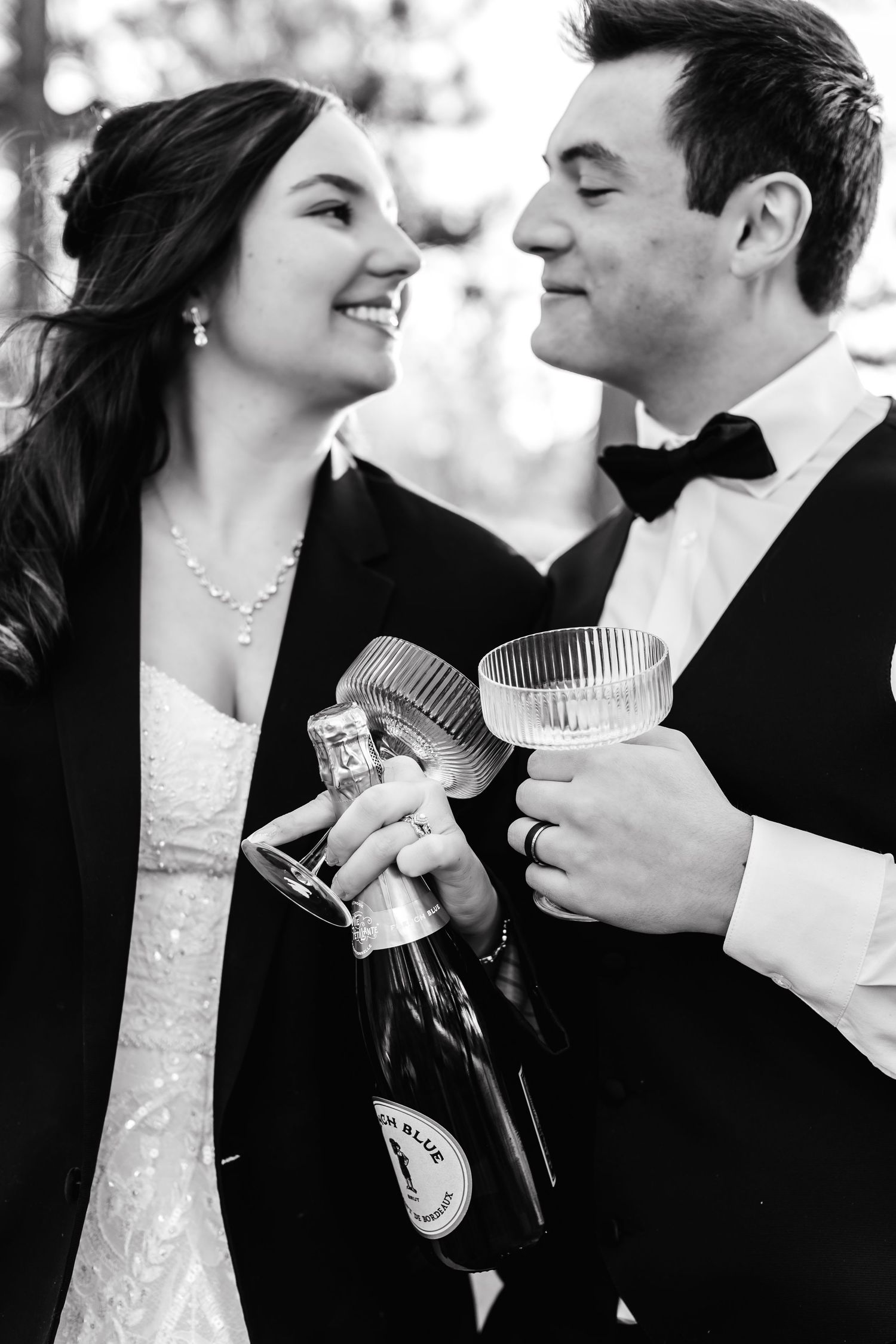 Black and white wedding photo sequence showing romantic close-up moments between a bride and groom.