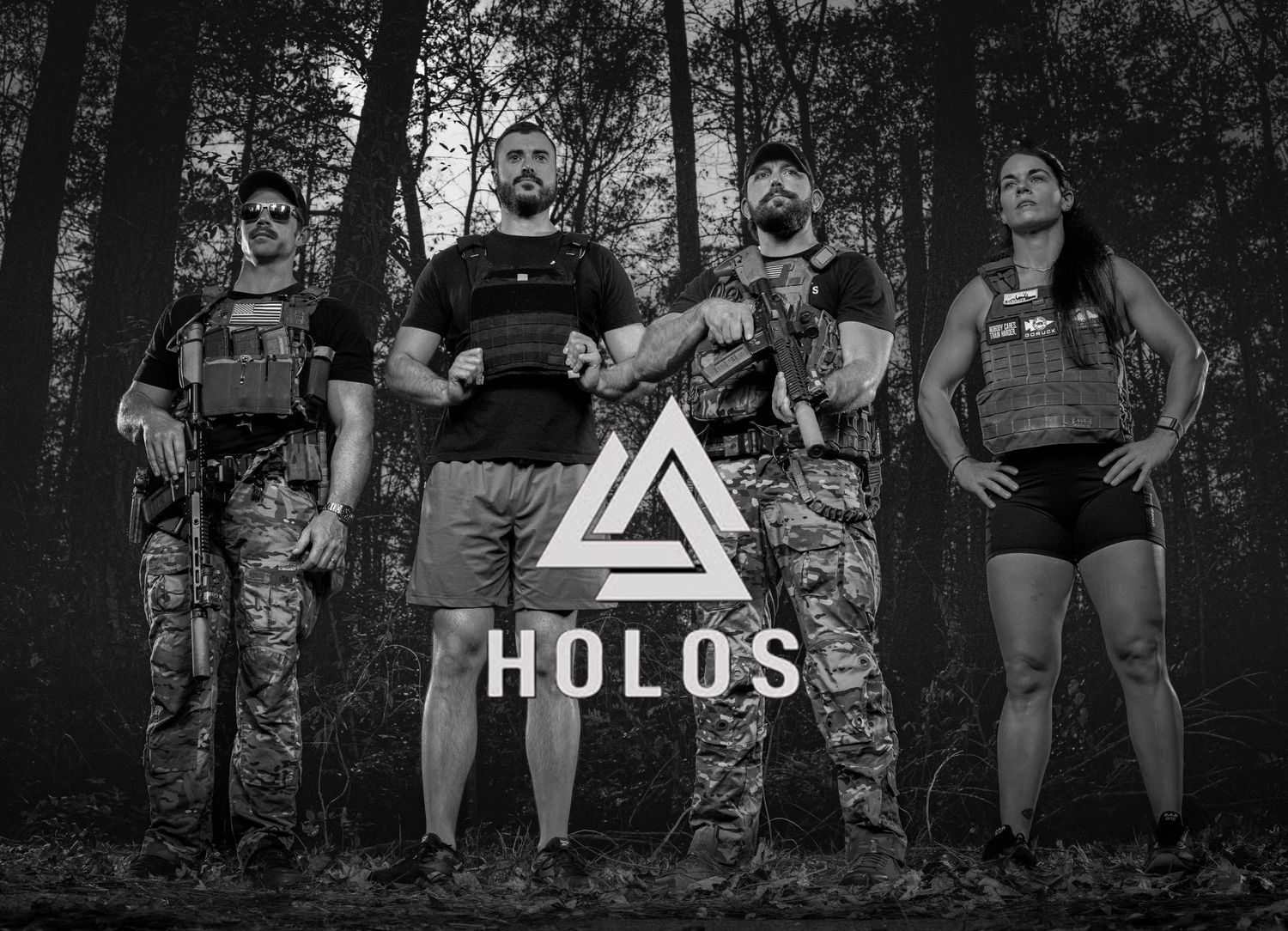 Black and white photo of four armed tactical team members with Holos logo in forest.
