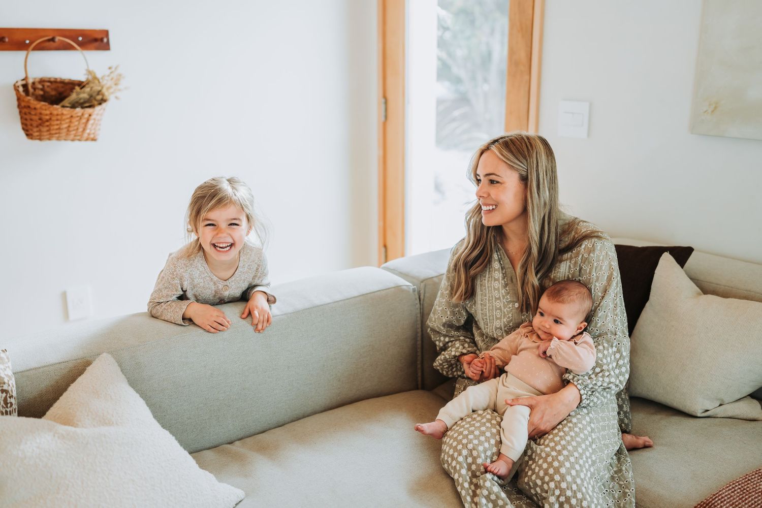 Lifestyle photo sequence showing relaxing moments on a white couch in a sunlit living room.