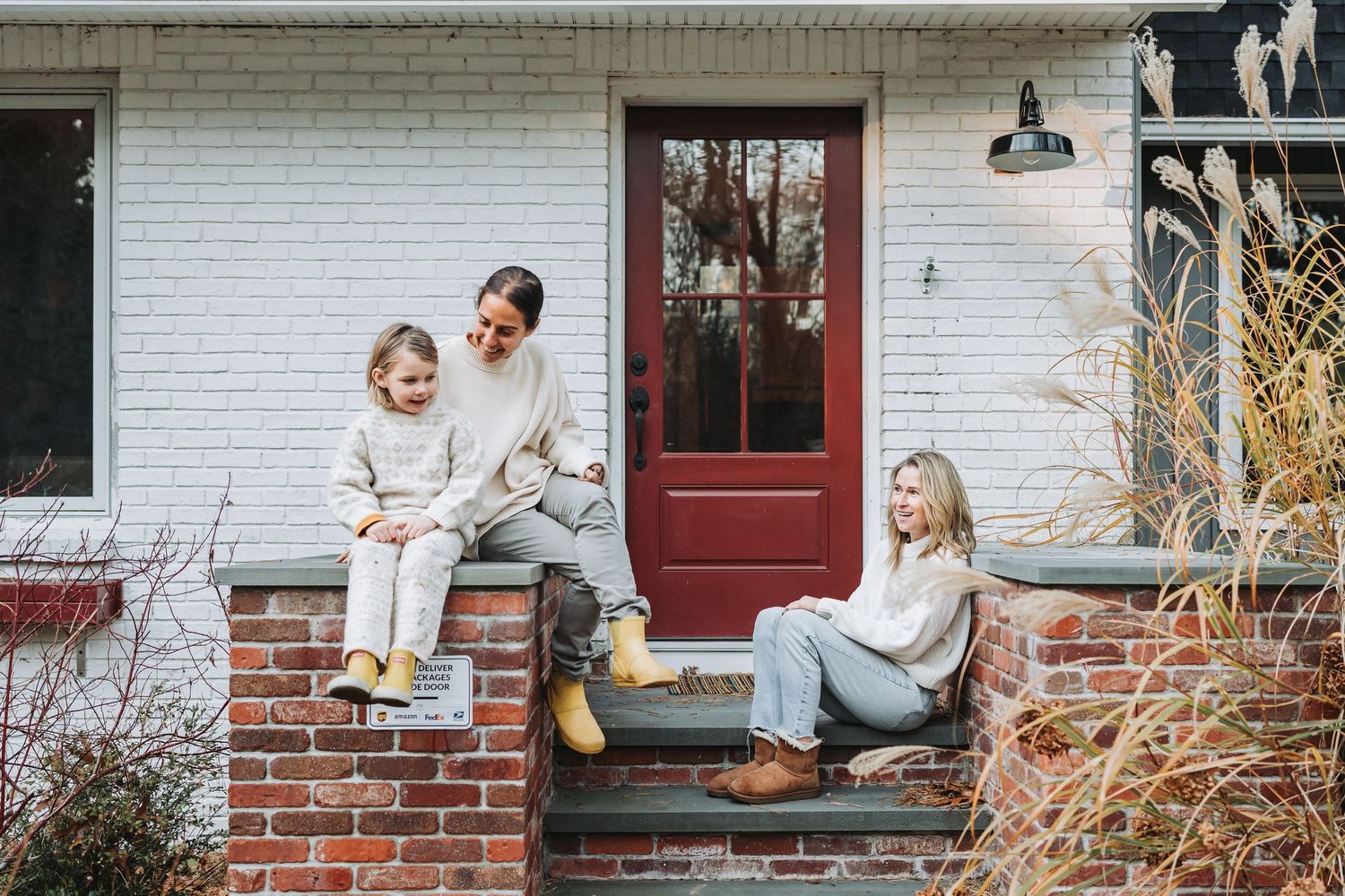 A series of candid lifestyle photos showing people sitting on front porches with brick walls and white trim details.