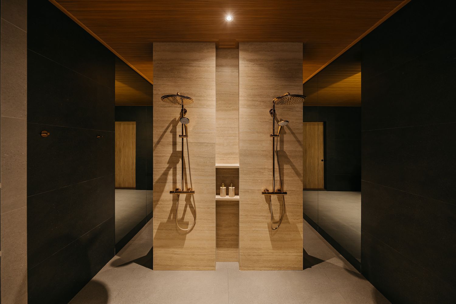 Modern interior hallway with warm lighting and wooden wall panels creating an elegant, minimalist atmosphere.