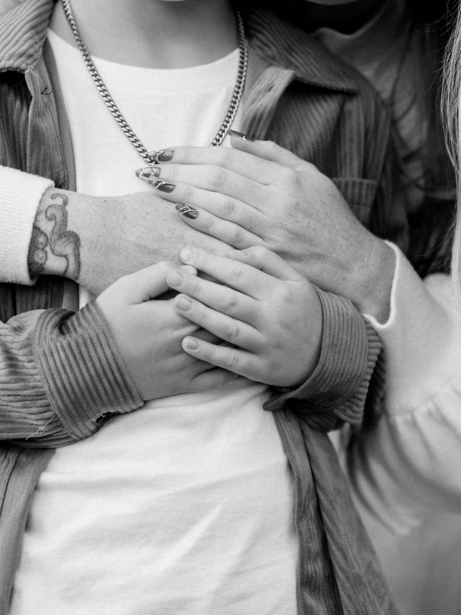A series of black and white photos showing hands holding coffee cups in similar poses against a light background.