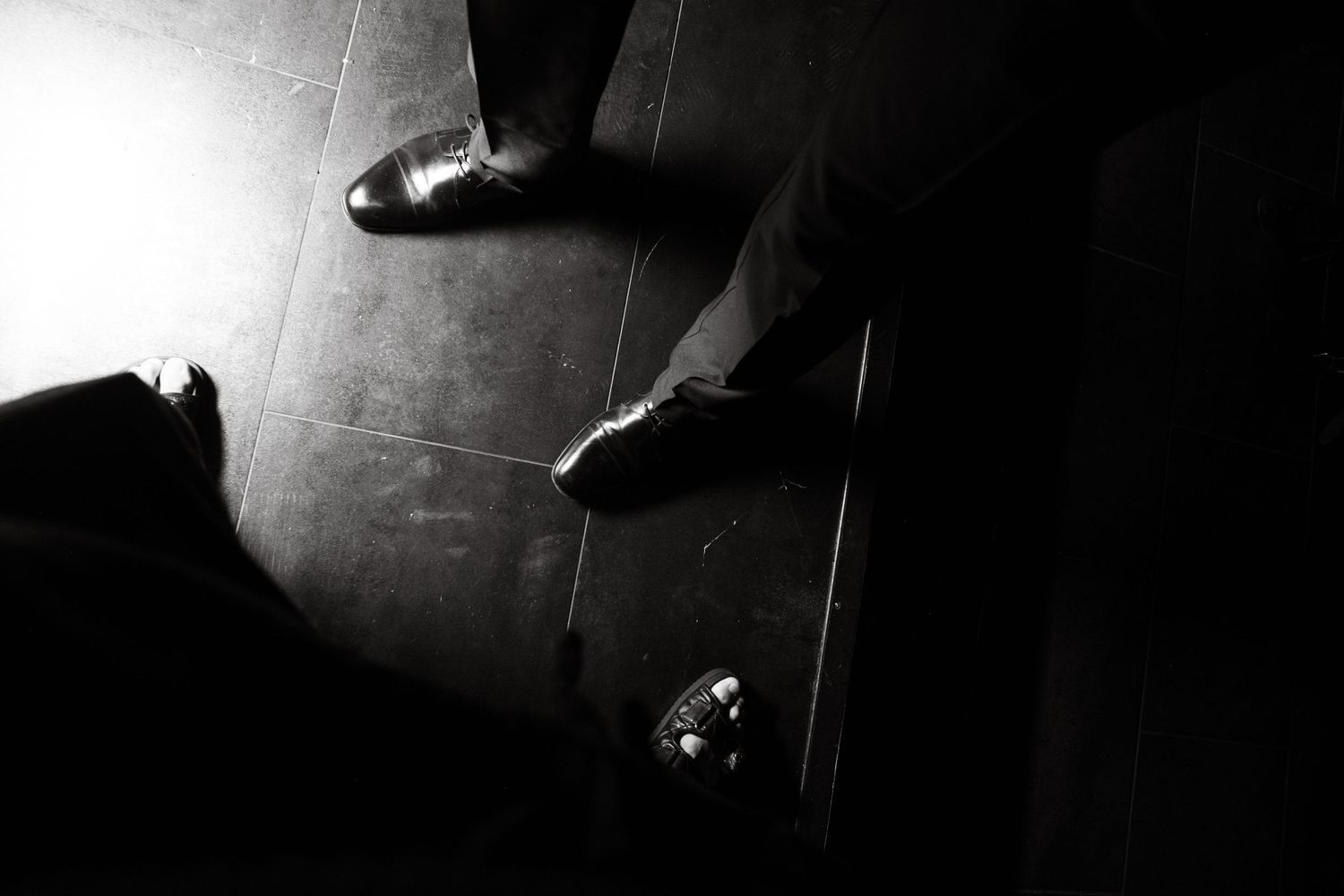 A ghostly black and white spooky photo sequence shows a silhouette emerging from darkness in six dramatic frames.
