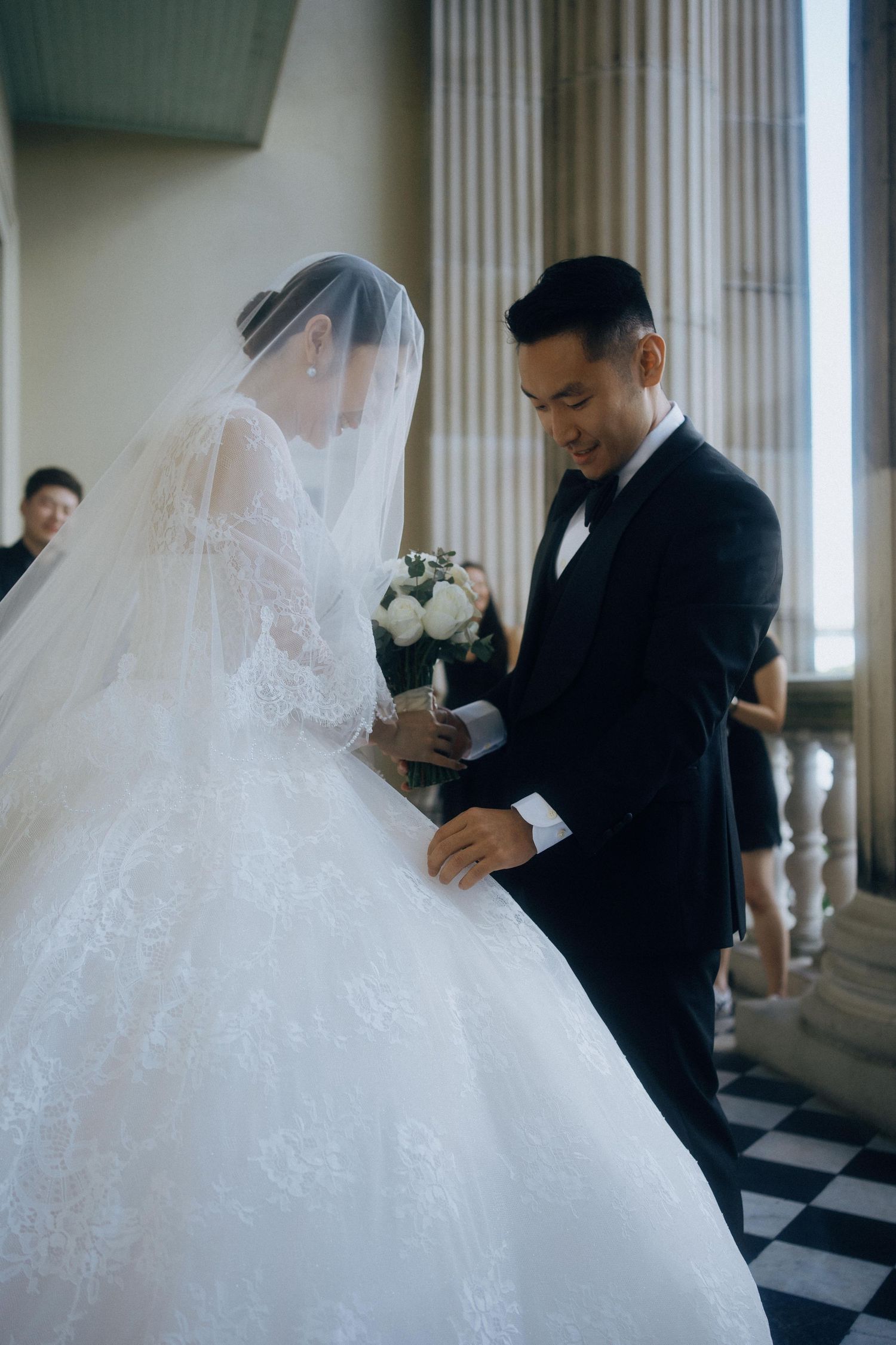 A series of candid moments capturing a bride and groom during a tender first look at their wedding.