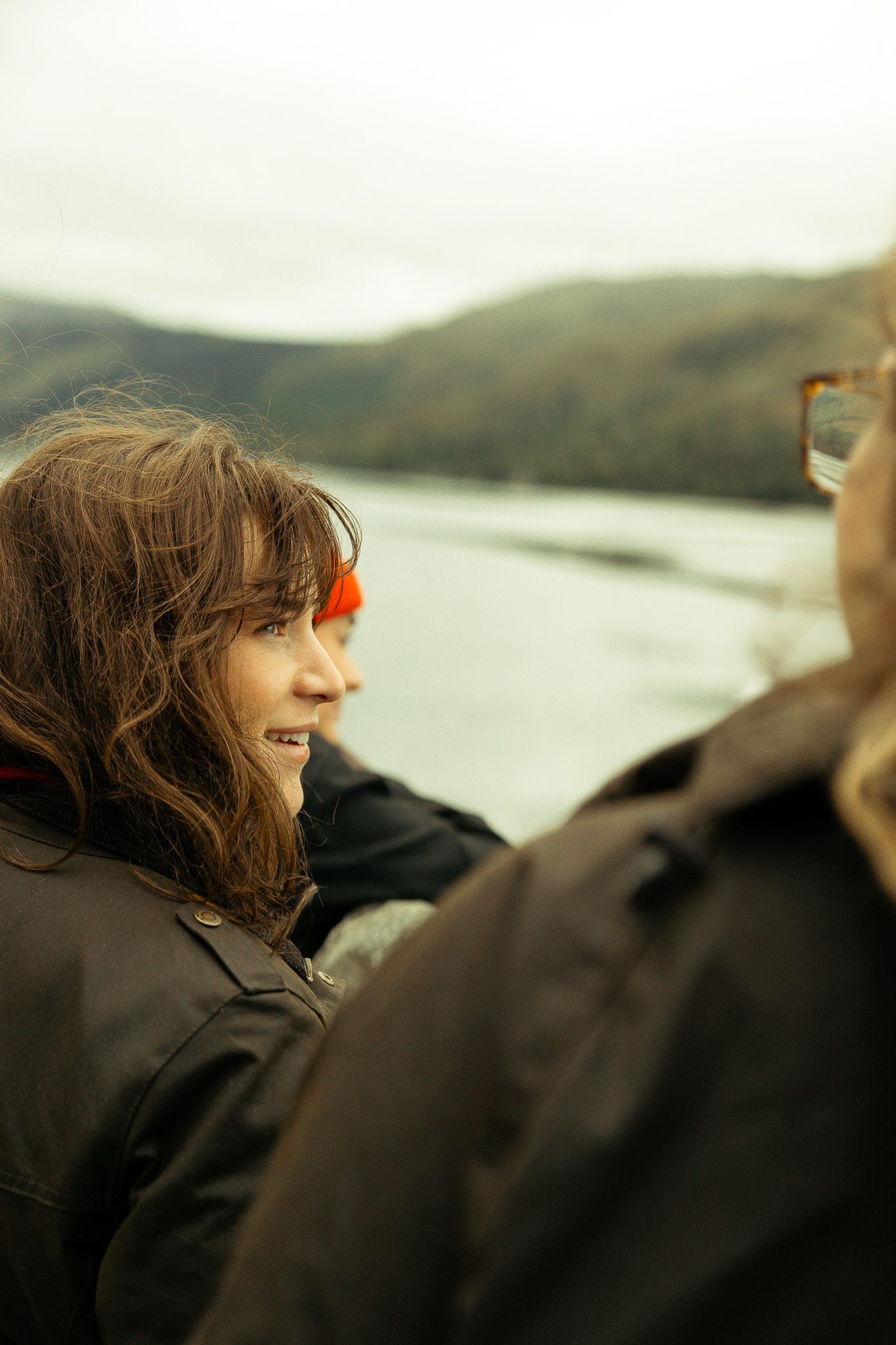 Girls standing in front of Eilean Donan Castle.