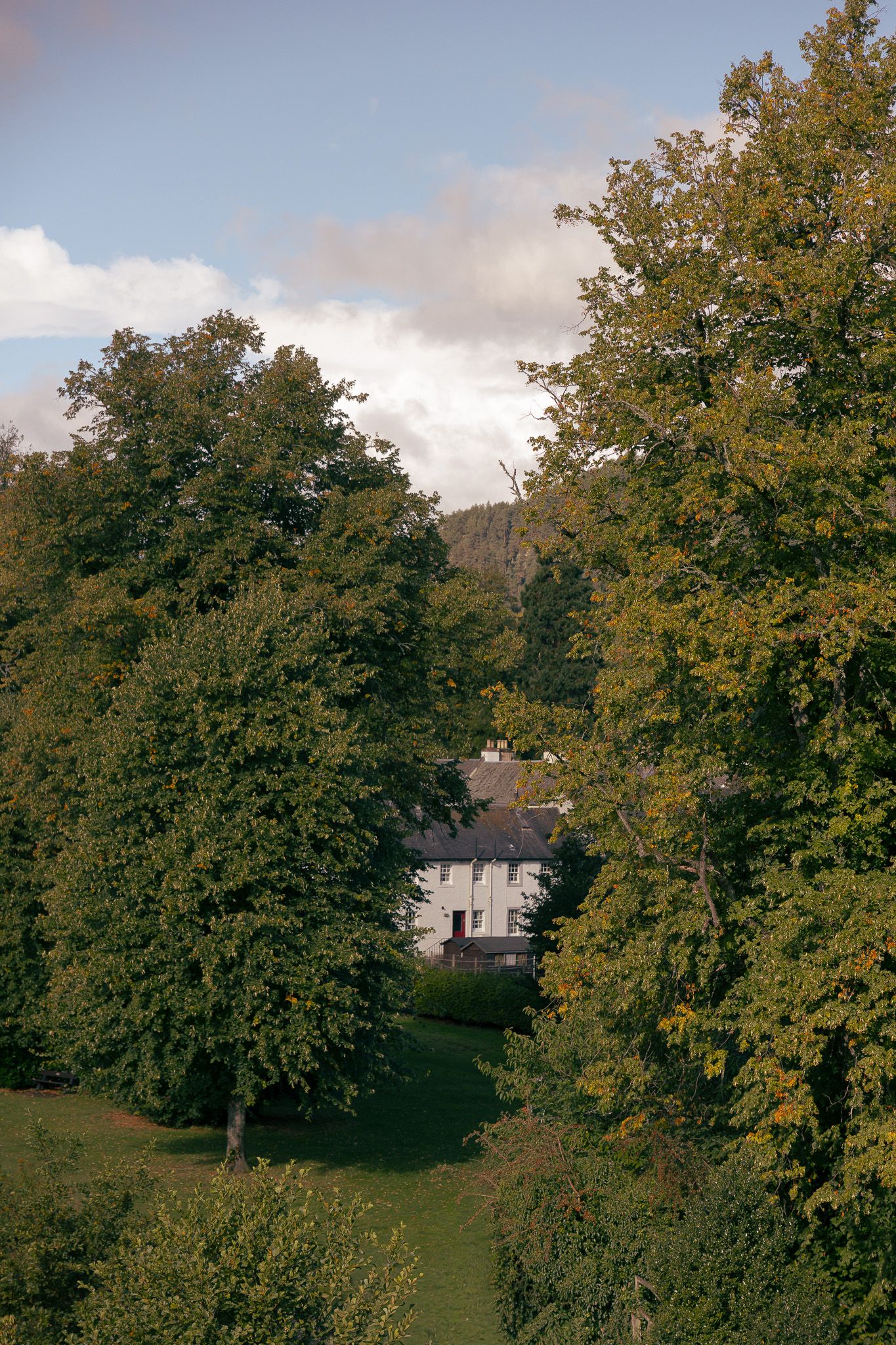 House through the trees in Dunkeld, Scotland.