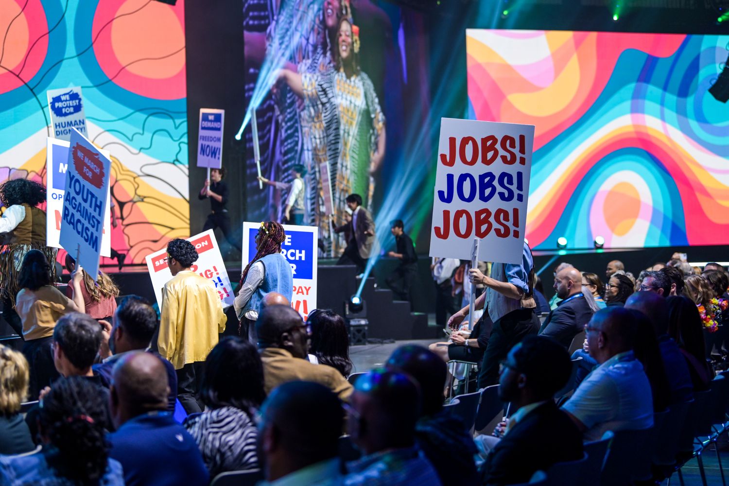 Large convention audience gathered for a presentation in Las Vegas