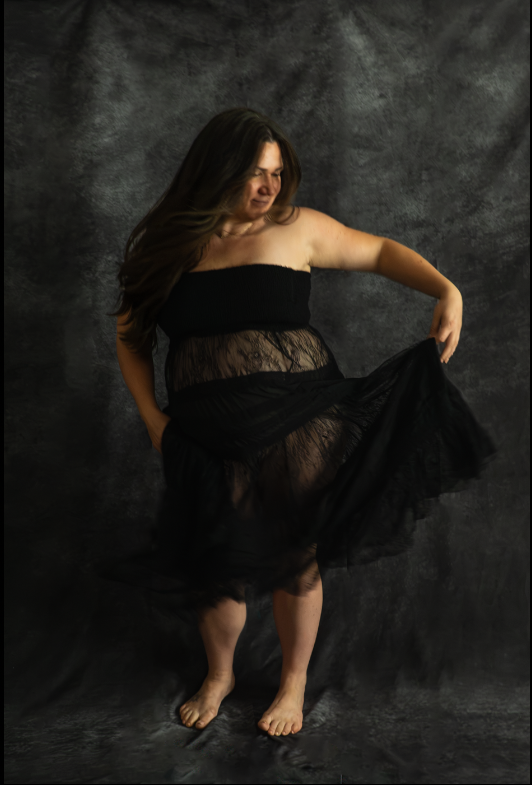 women dancing in a portrait about empowering pregnancy