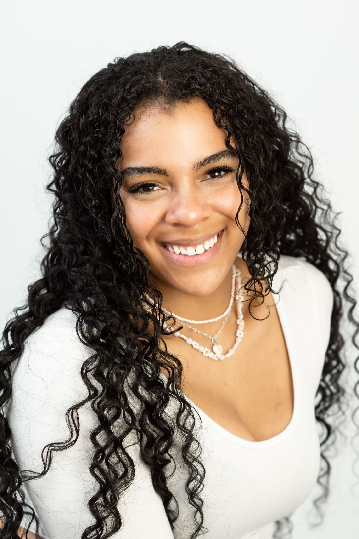 simple headshot of an actor in elmira new york  wearing a white shirt with black hair