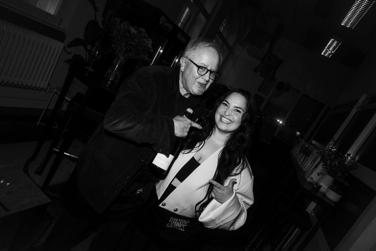 Candid black and white shots of people at a social gathering.