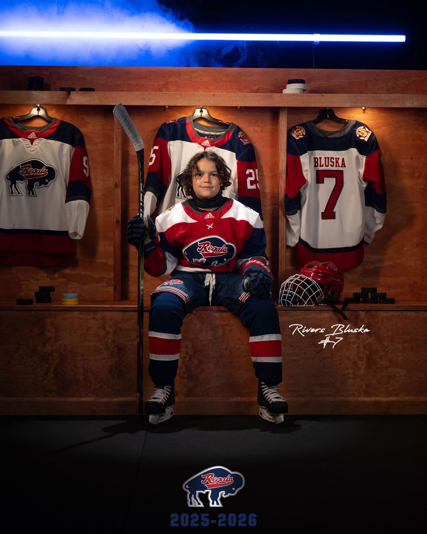 Hockey jerseys and equipment displayed in wooden locker room stalls with dramatic lighting and team logo visible.