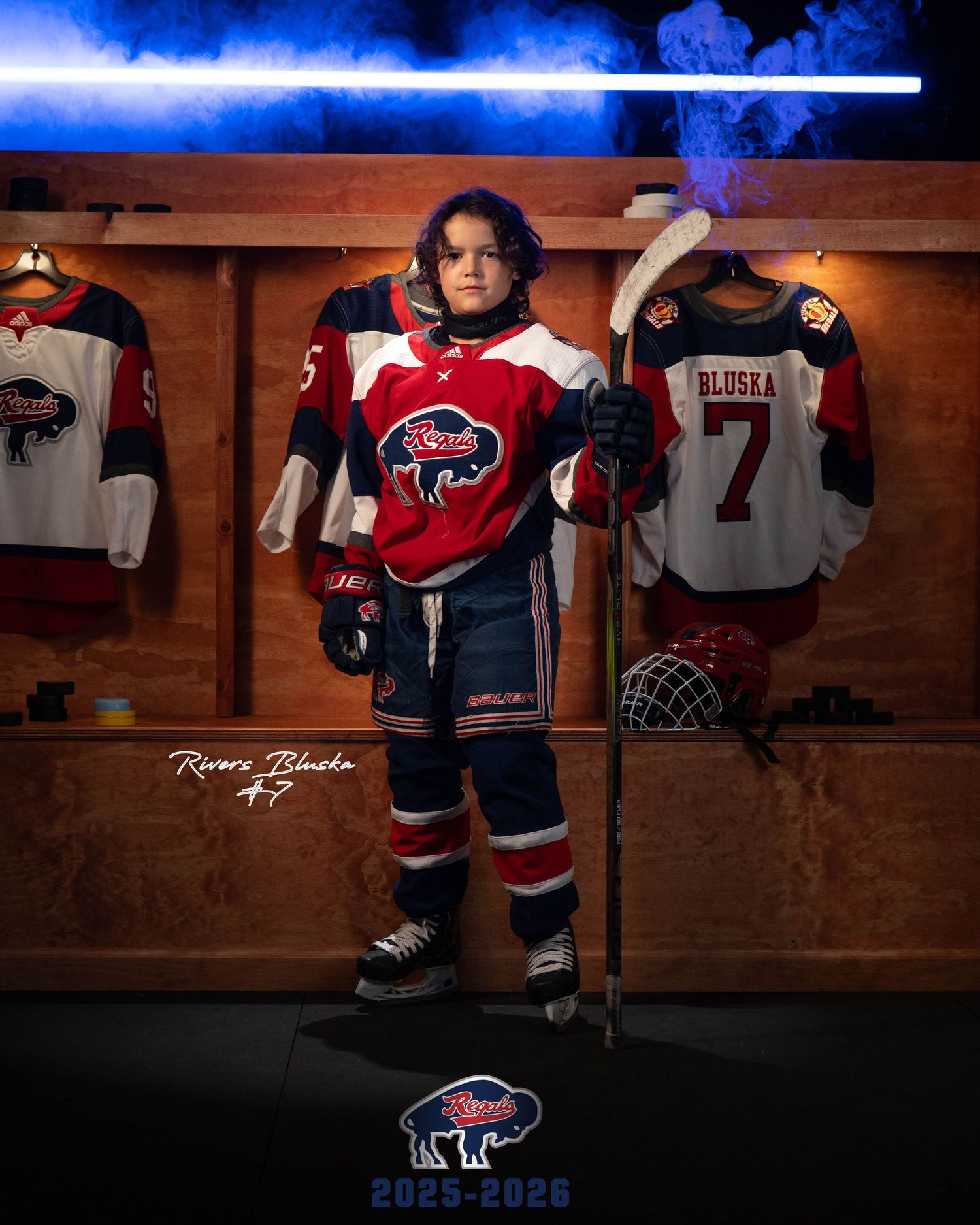 Hockey locker room with jerseys and equipment displayed on wooden walls in dramatic lighting.