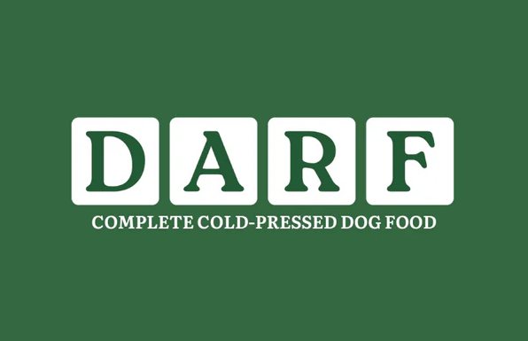 Green banner with white text displaying DARF complete cold-pressed dog food branding.