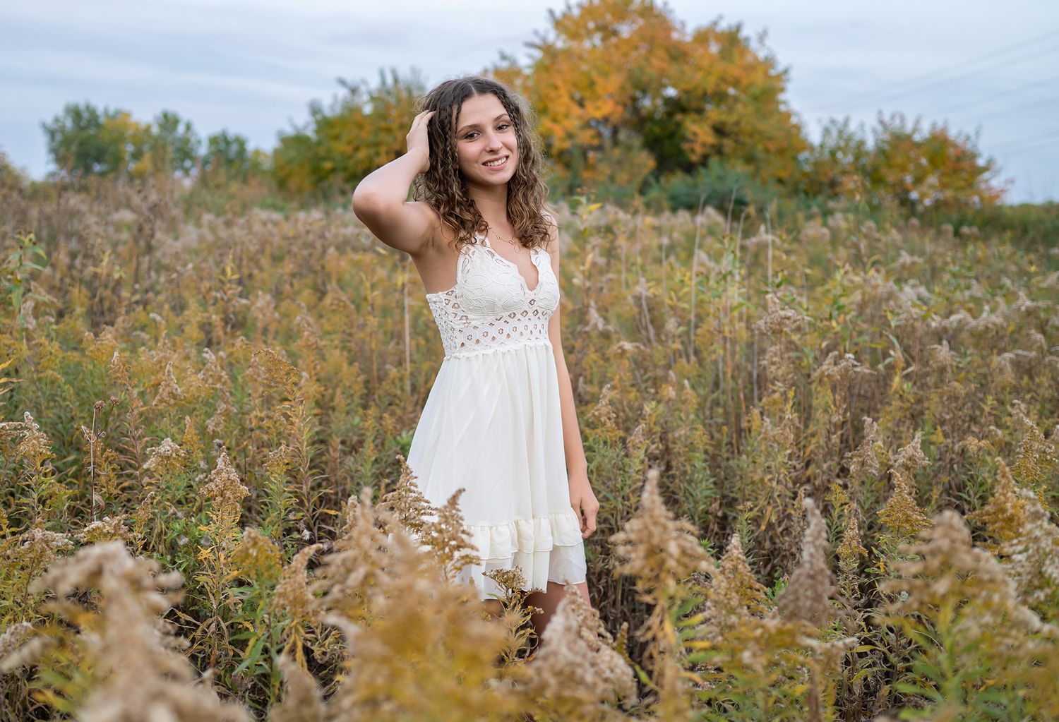 high school senior girl in field