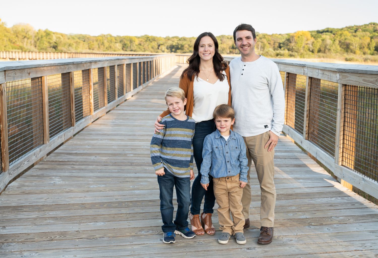 family on boardwalk