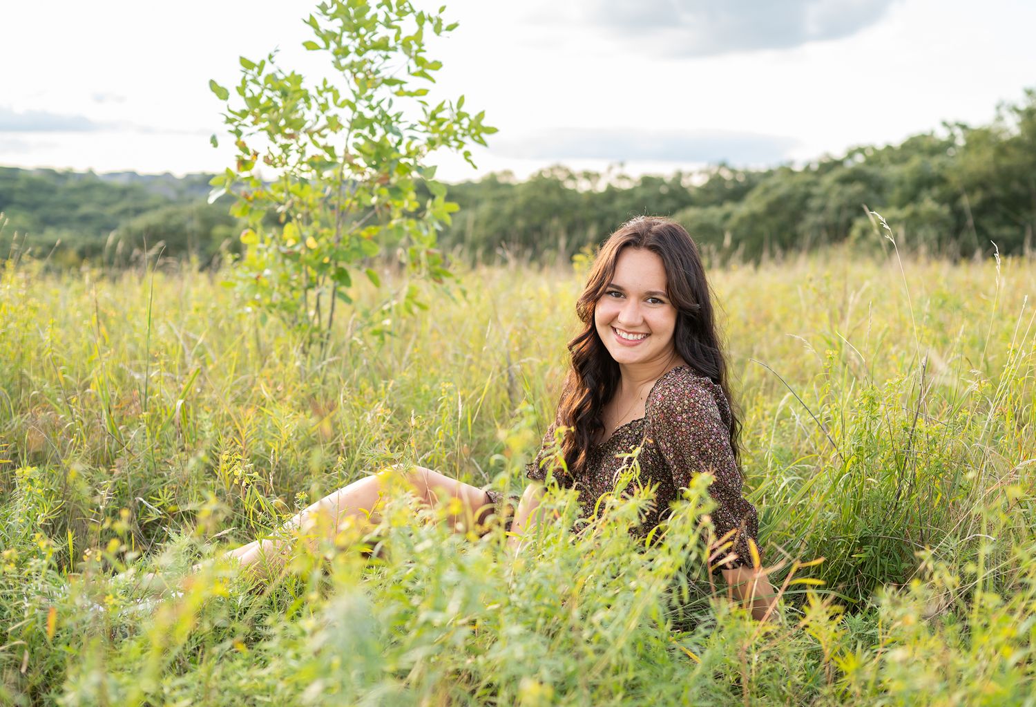 senior girl flowers field