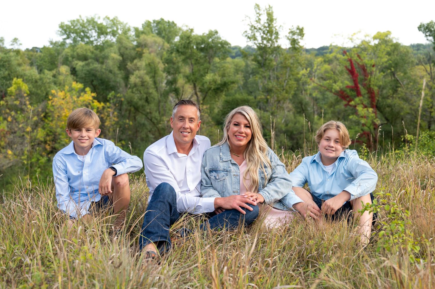 parents and children in a field