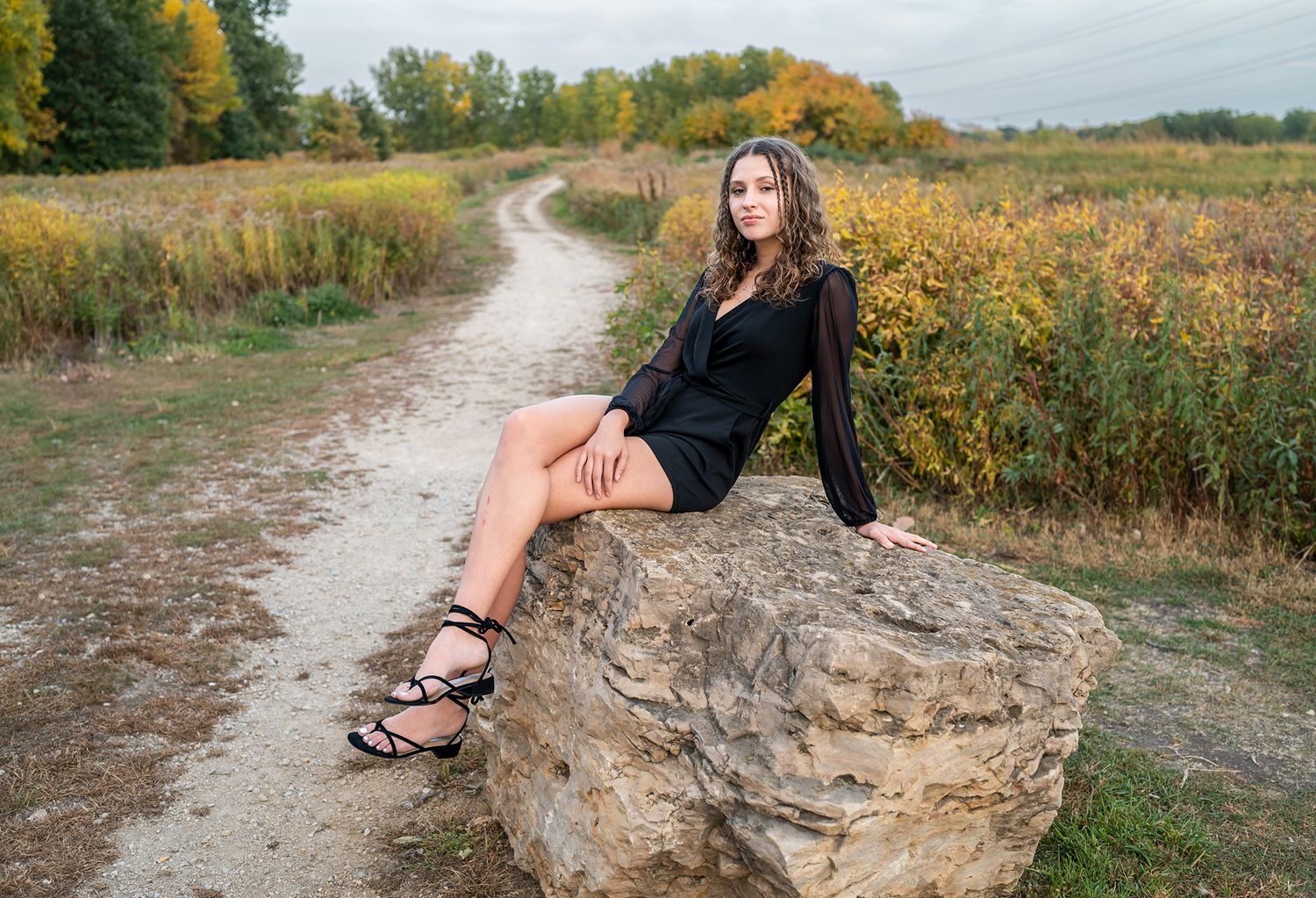 girl on large rock