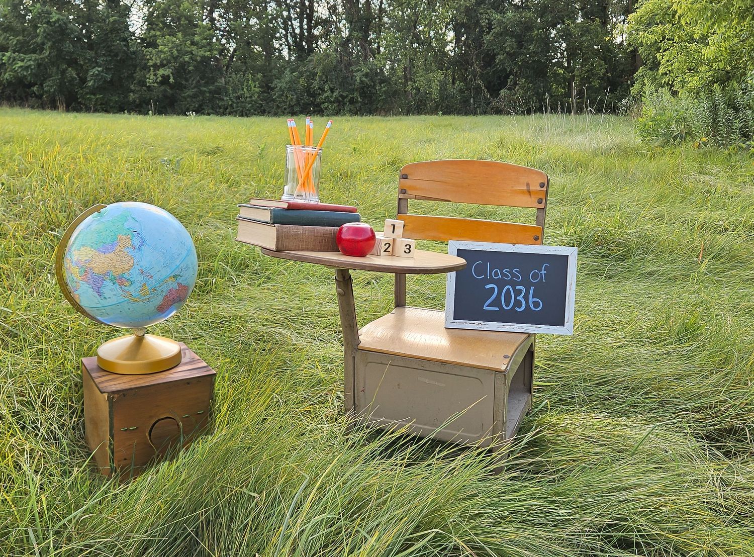 back to school desk apples globe
