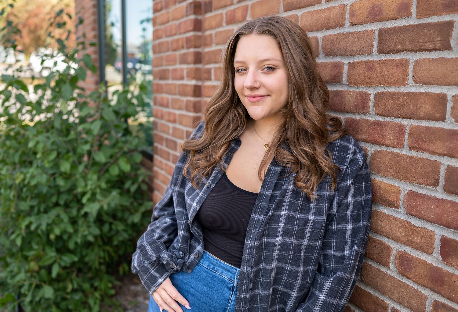 senior girl red brick wall