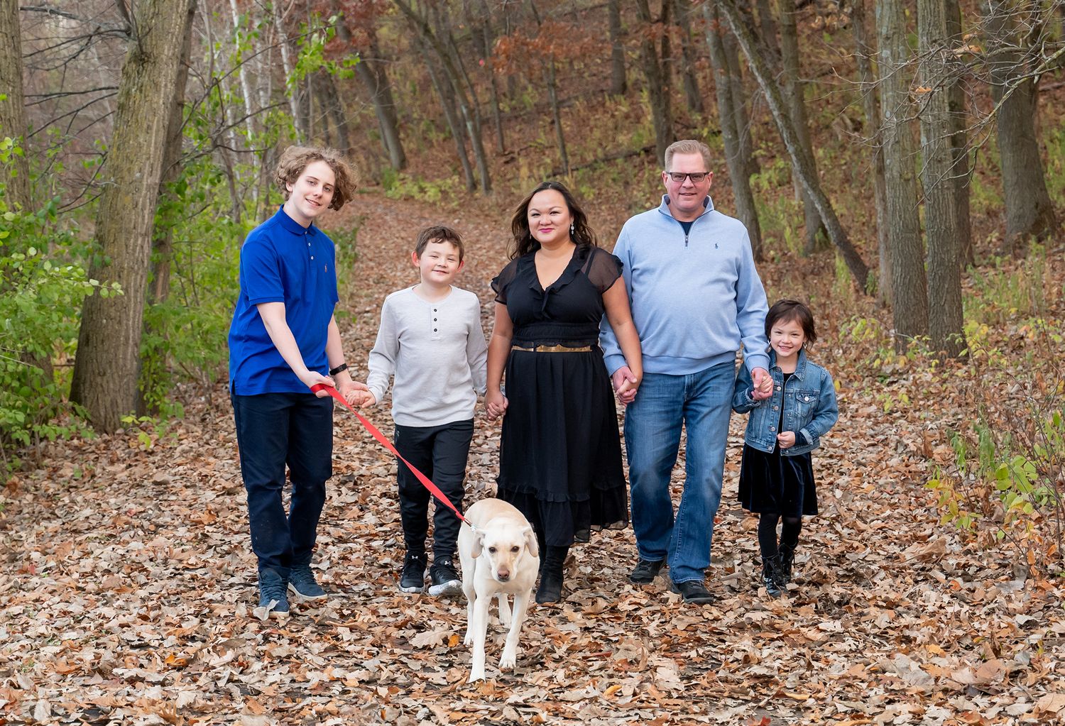 fall leaves family walking