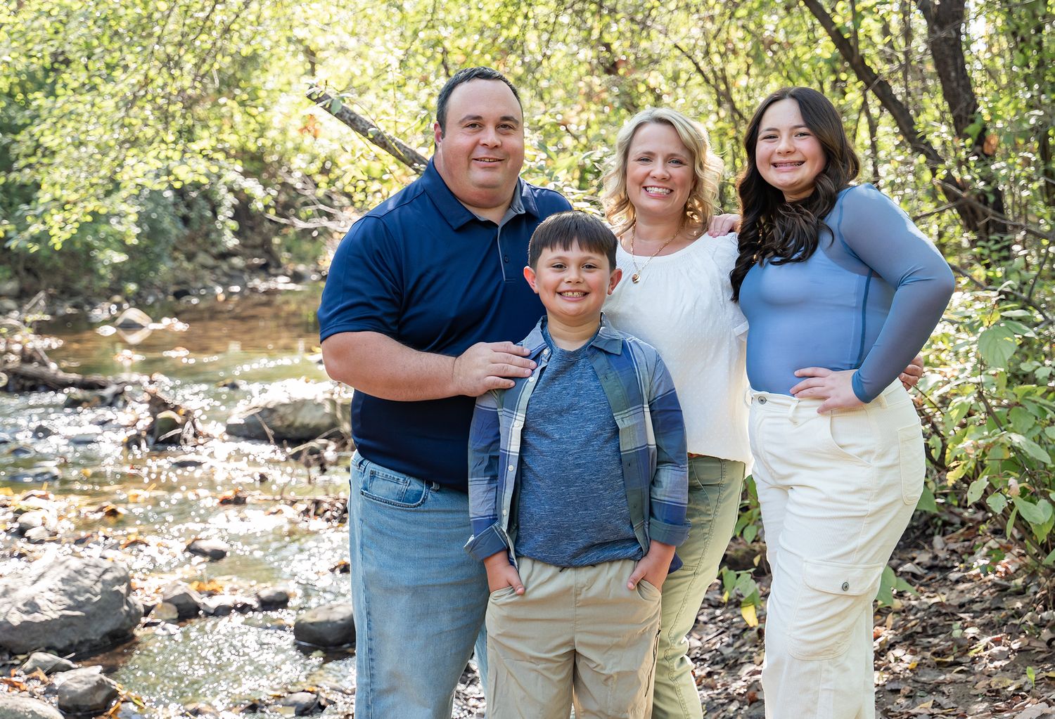 family near creek water