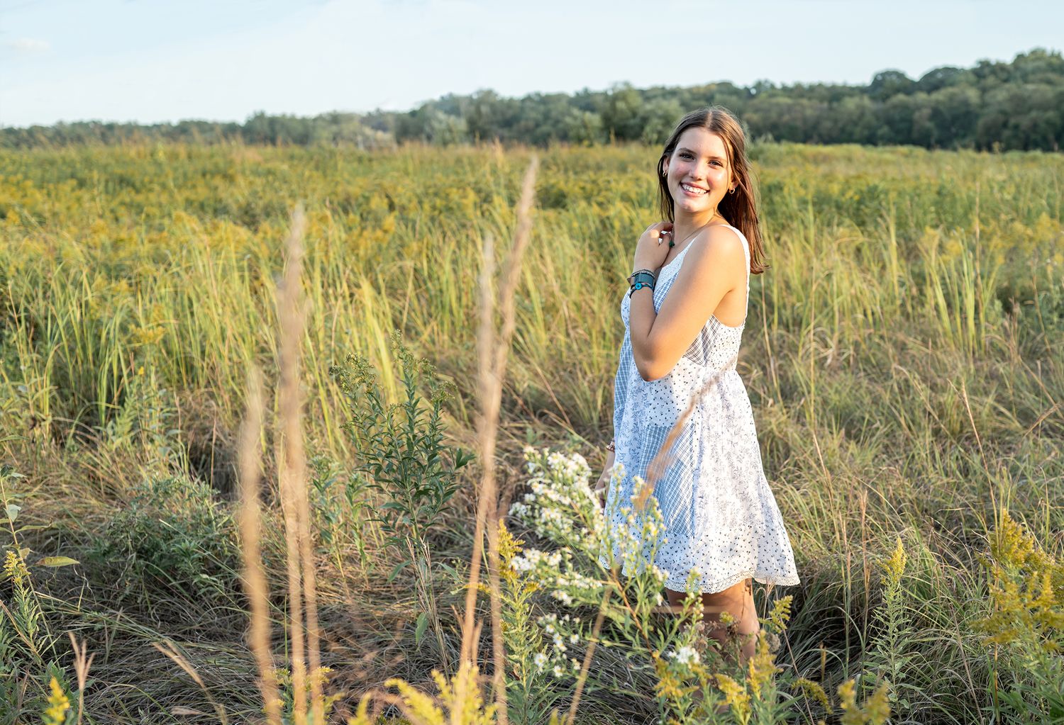 beautiful senior girl in field
