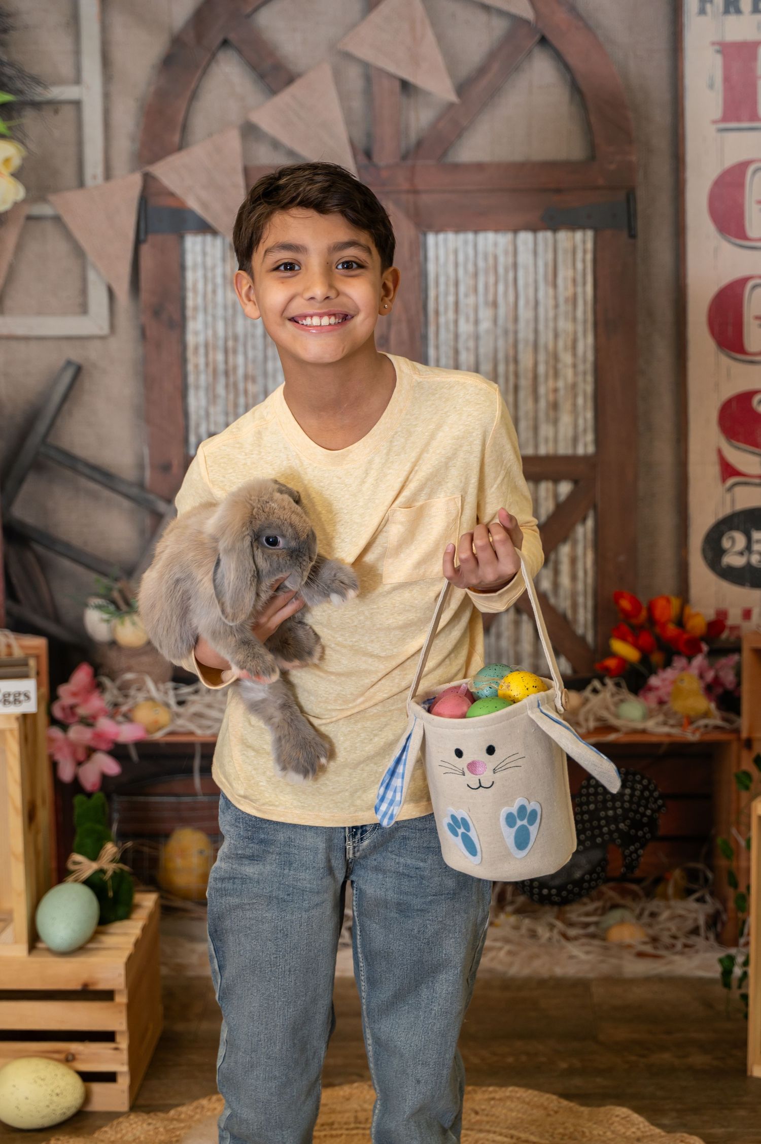 A child in jeans and yellow shirt holds a small gray bunny rabbit in three progressive photos showing their interaction.