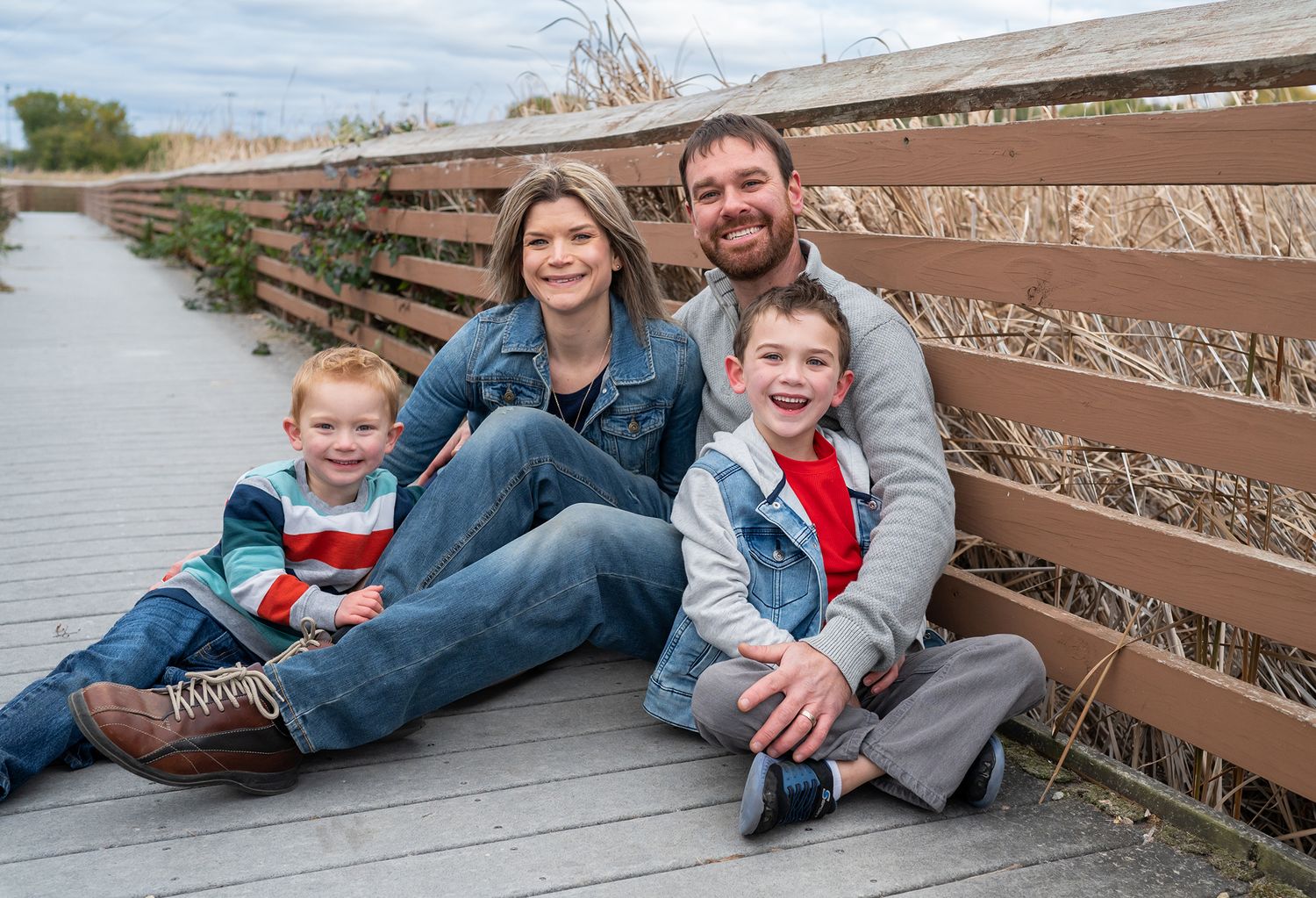 family on boardwalk