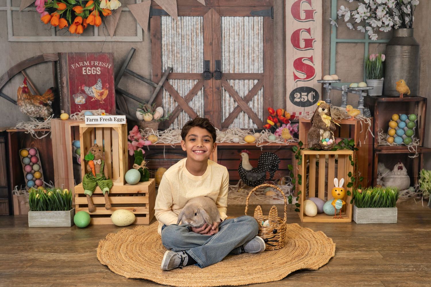 A cozy home decor display featuring fall pumpkins, sunflowers, and rustic wooden elements on a front porch.