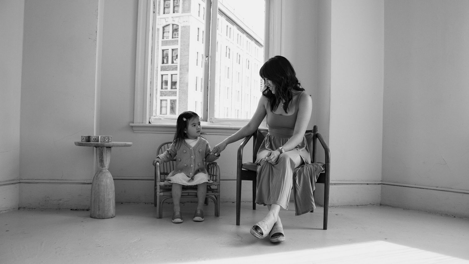 Intimate black and white portrait of mother and daughter in a studio in Vancouver, BC.
