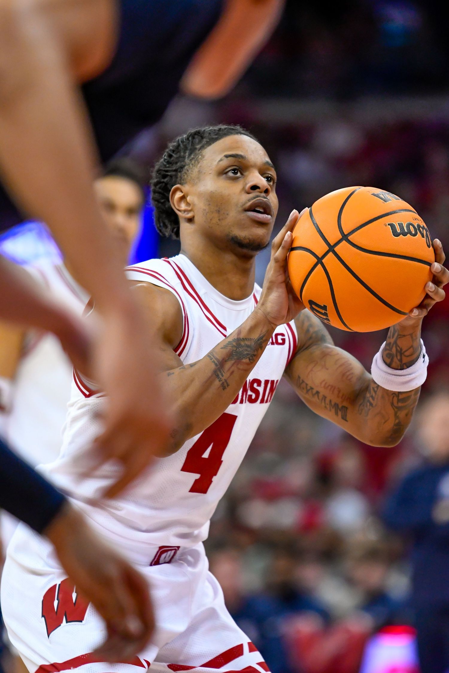 Basketball player prepares to take a shot