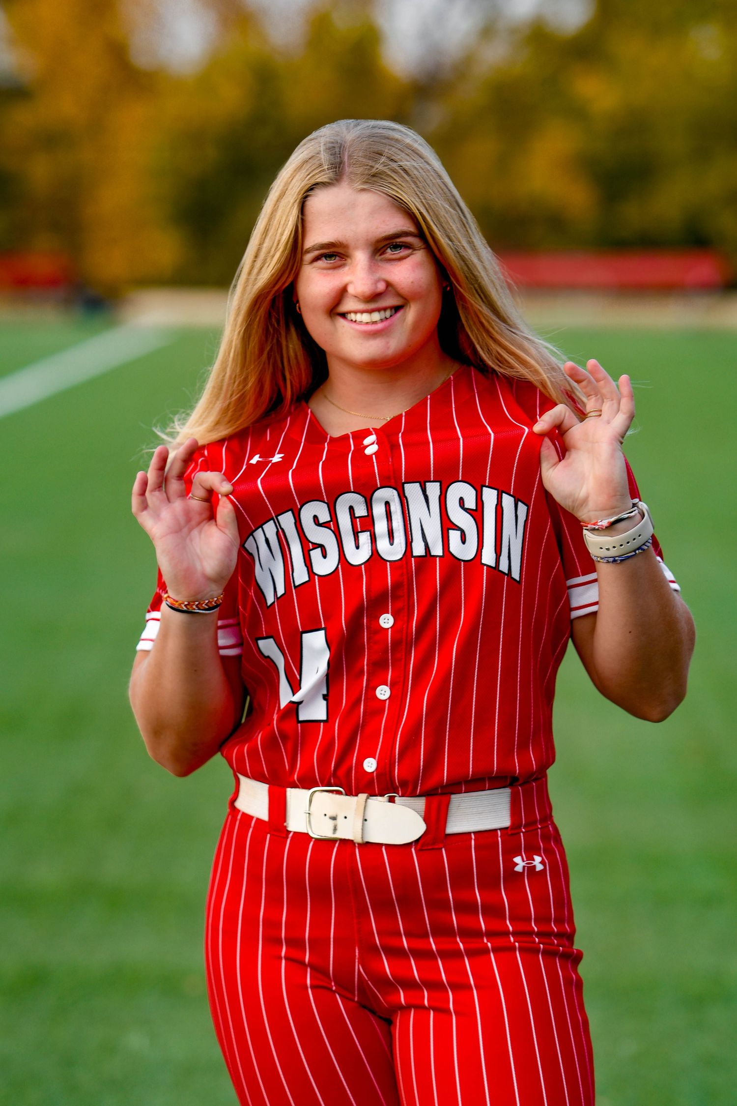 Girl smiling holding her jersey