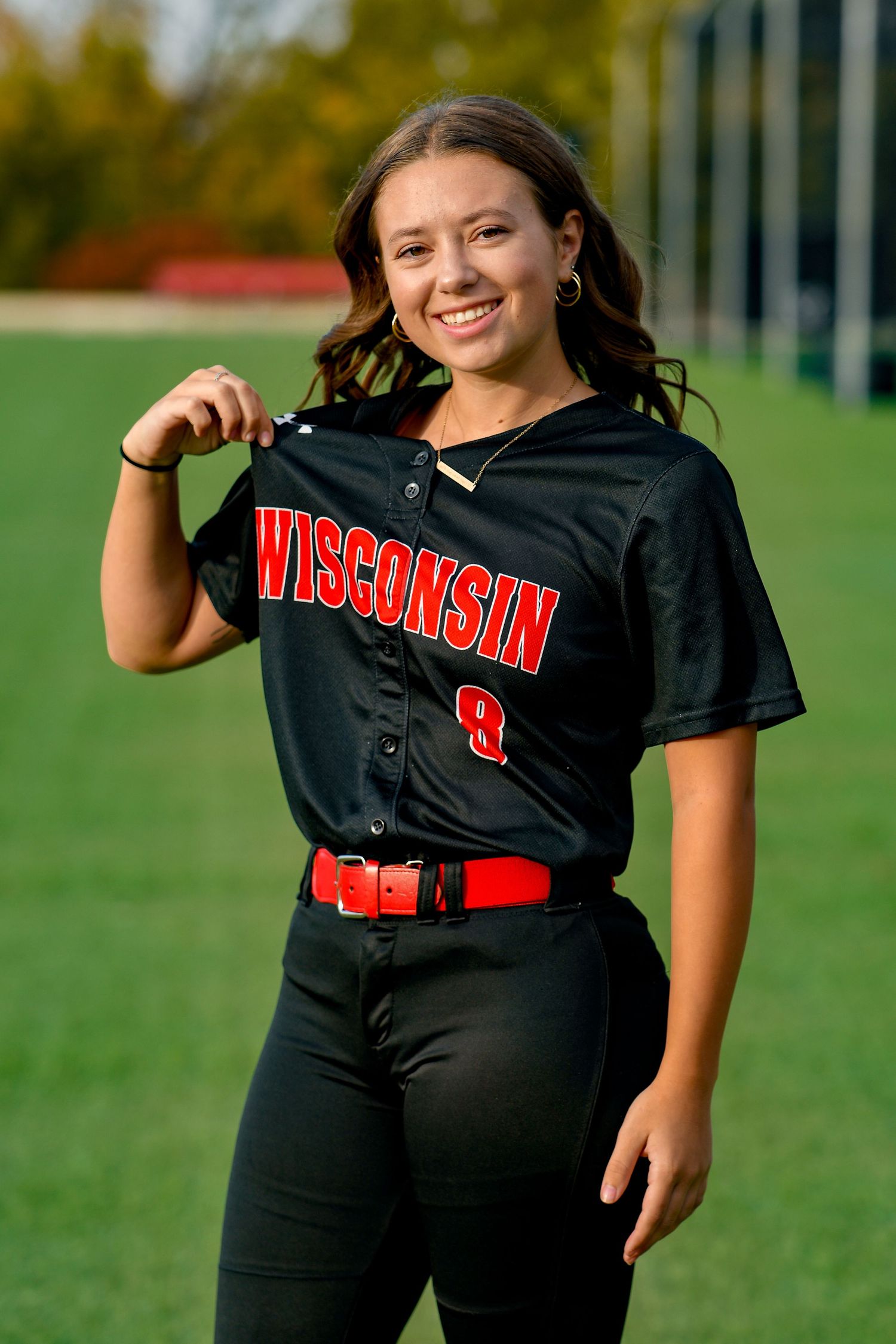Girl holding jersey