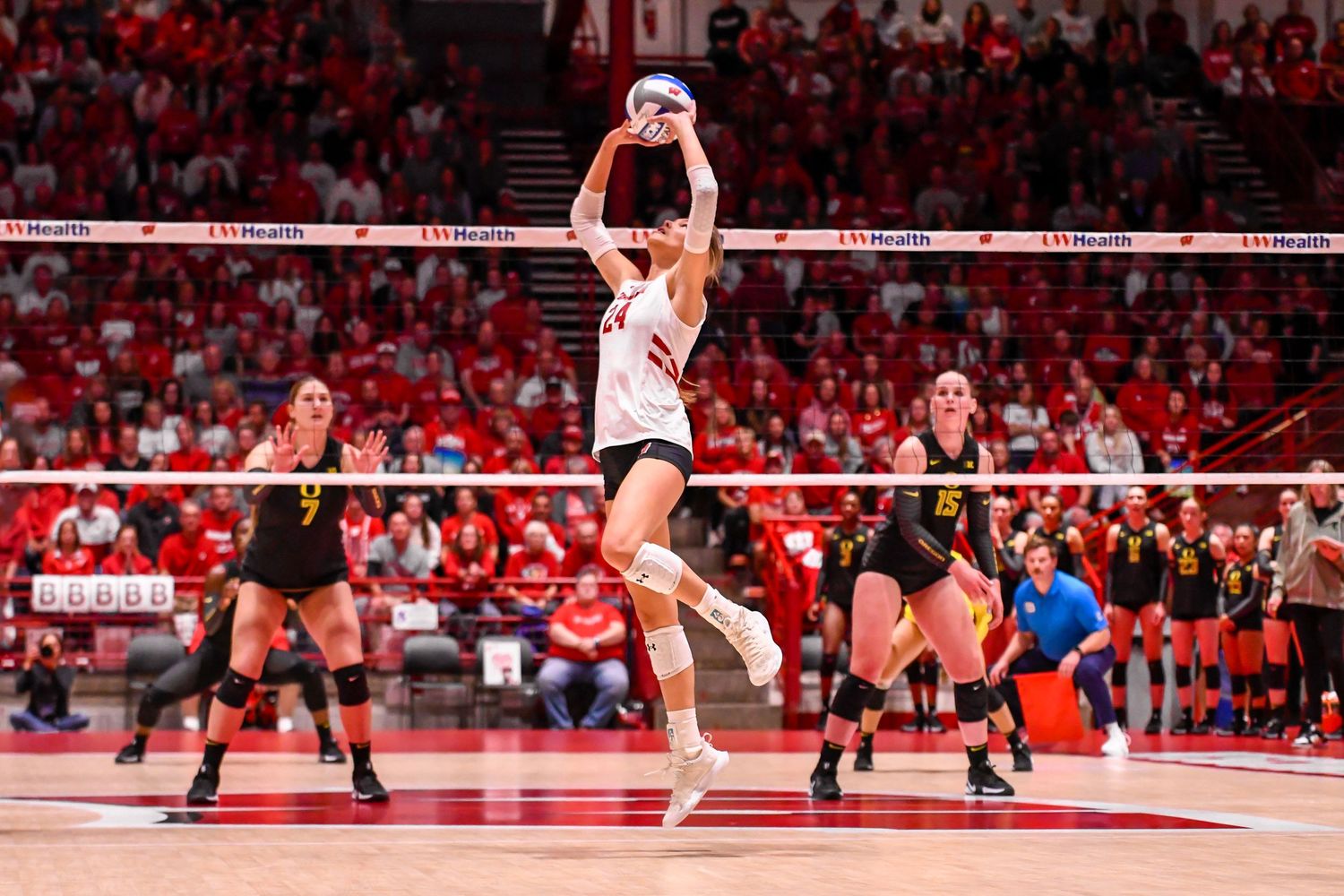 Volleyball player sets the ball