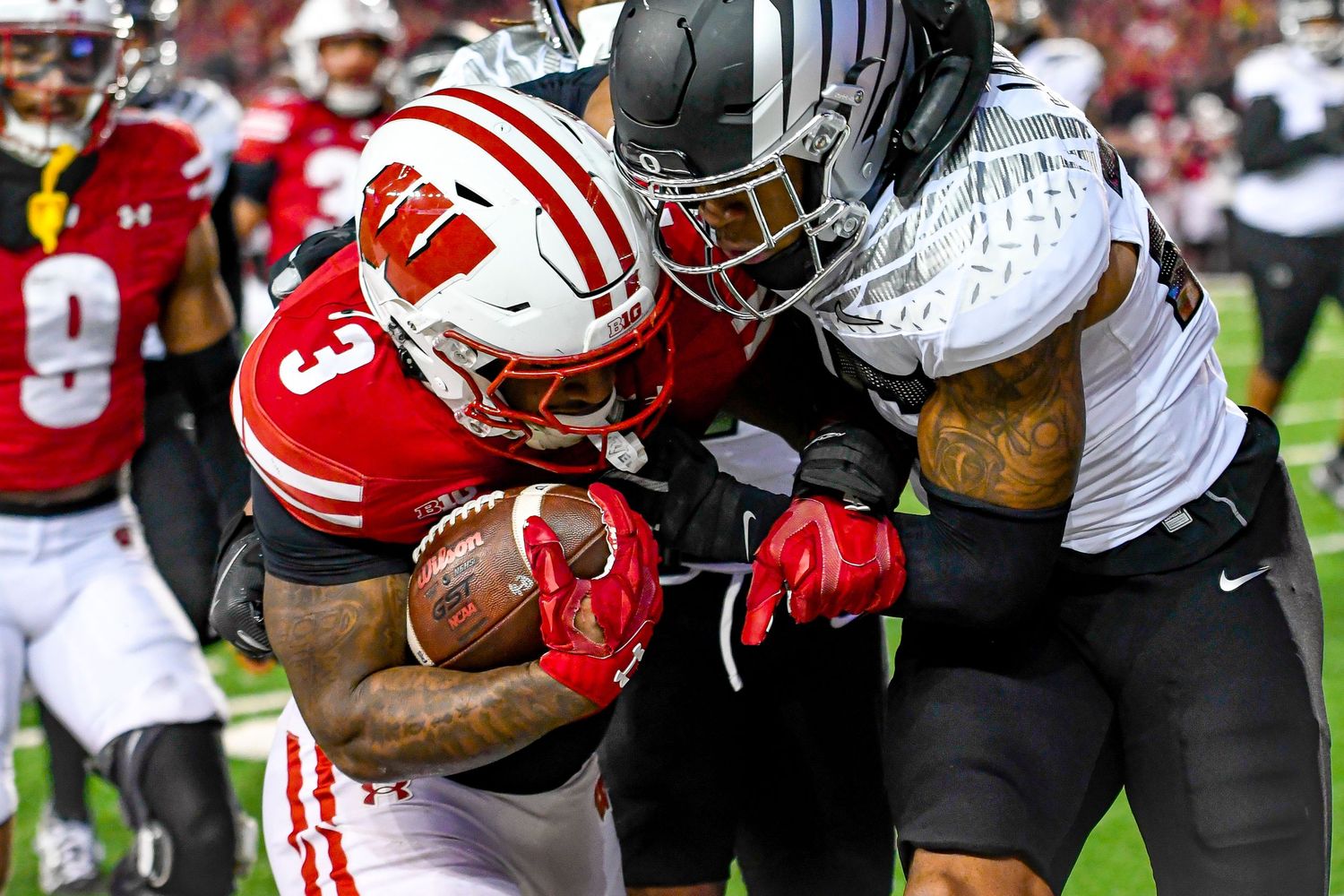 Football players fighting for the ball