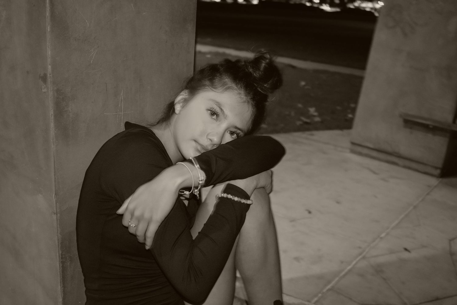 Series of artistic black and white portraits showing contemplative poses.