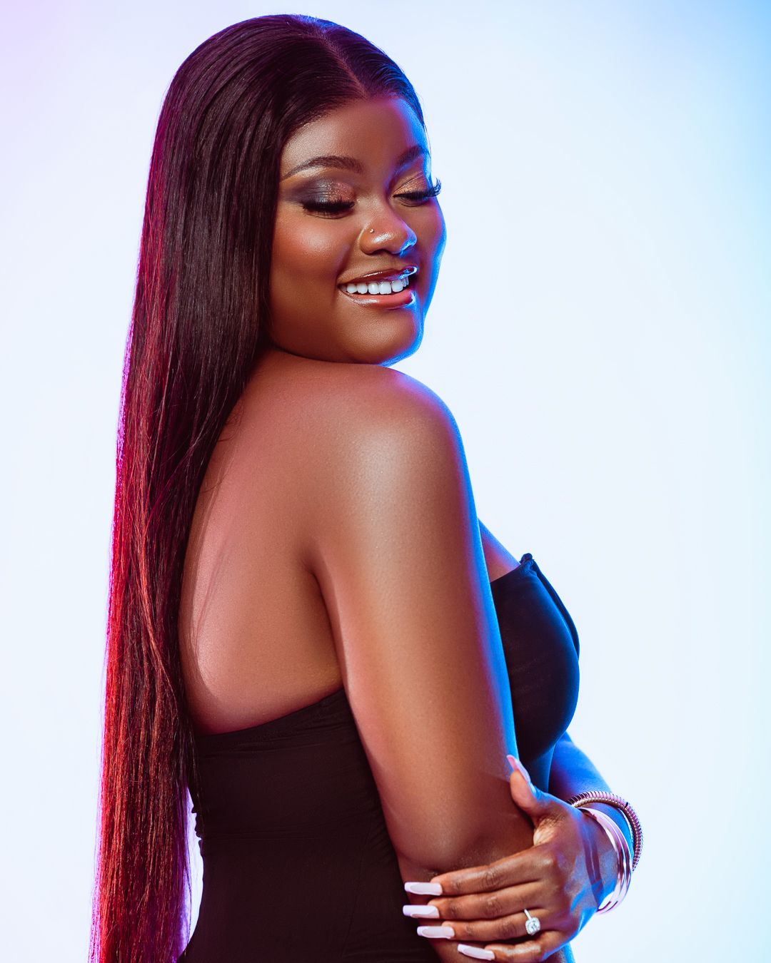 Portrait series with dramatic lighting featuring long straight hair and blue-red color effects.