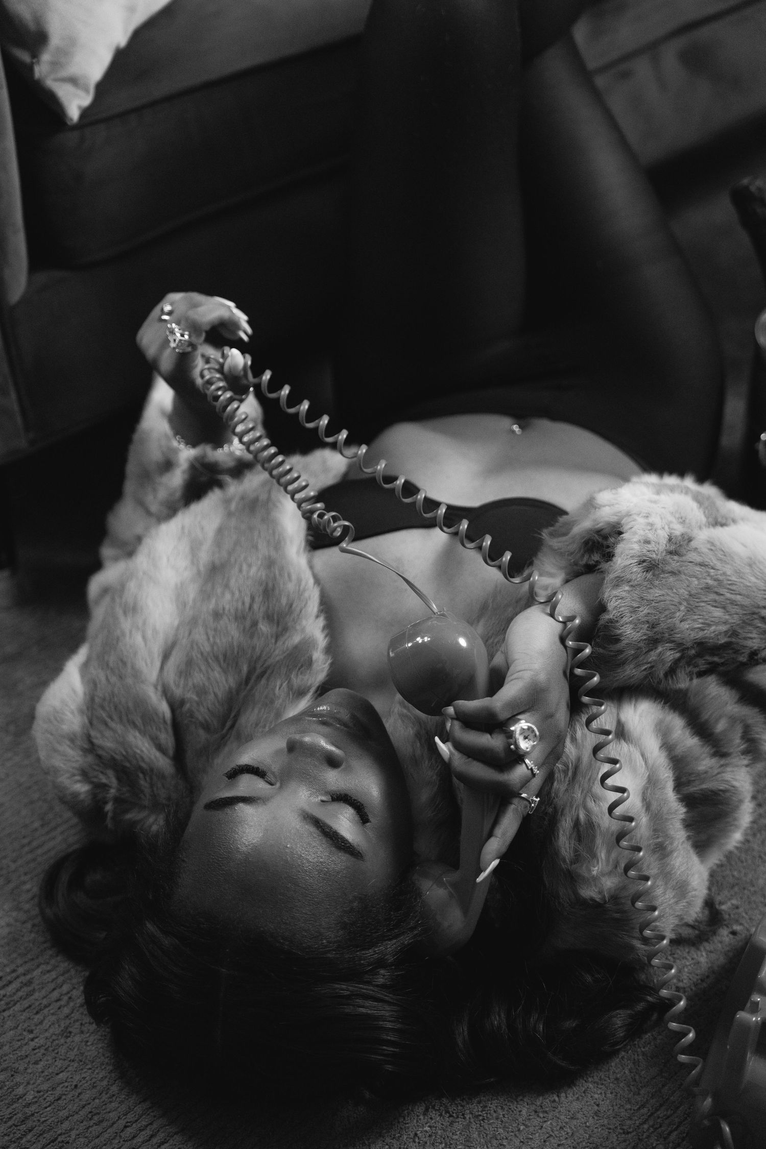 Black and white portrait series showing a person lying down with closed eyes in a contemplative state.