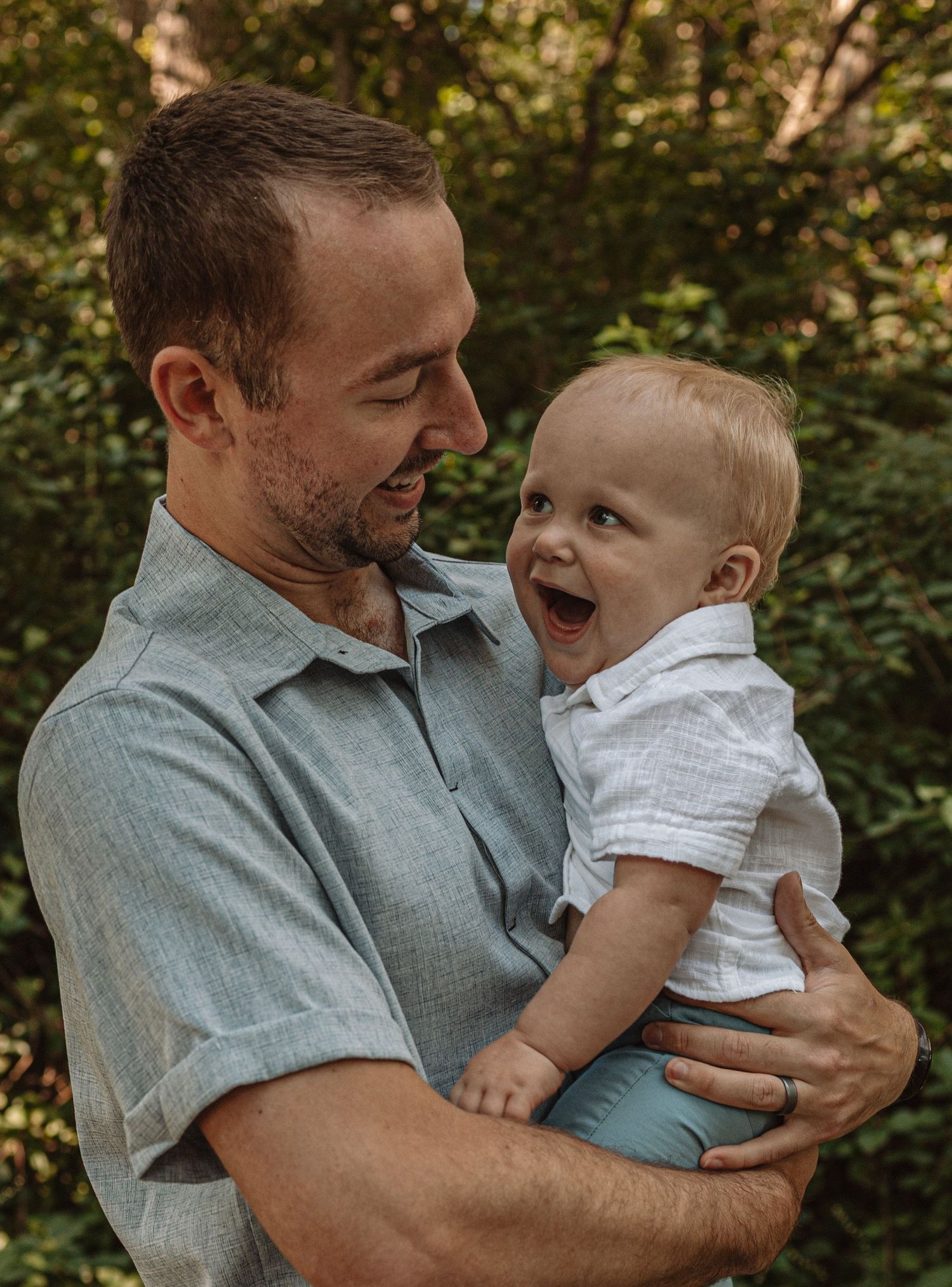A joyful outdoor moment captured in a sequence showing a parent and baby sharing laughter and smiles in natural lighting.