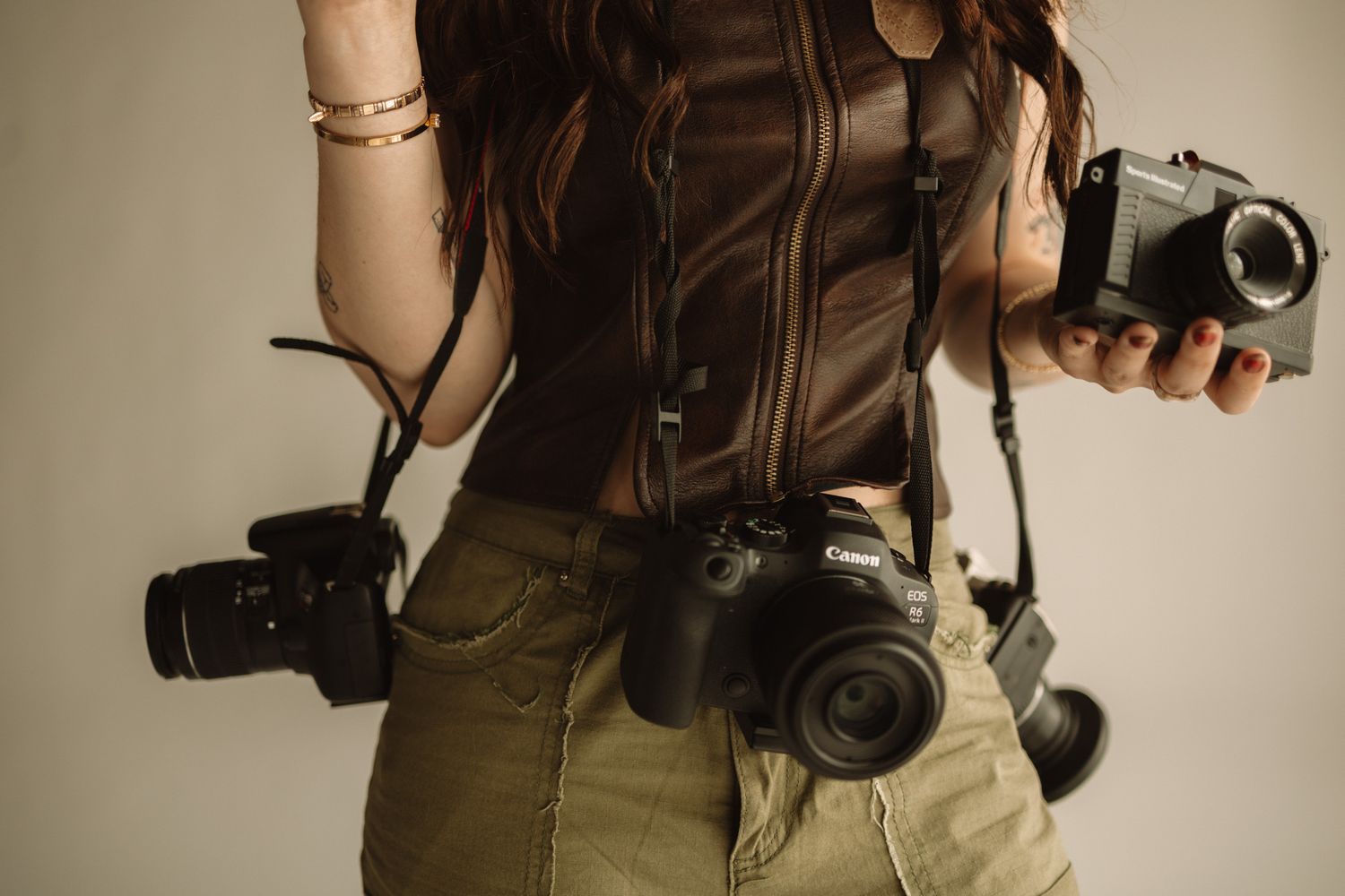 Collection of professional camera gear and equipment arranged artistically.