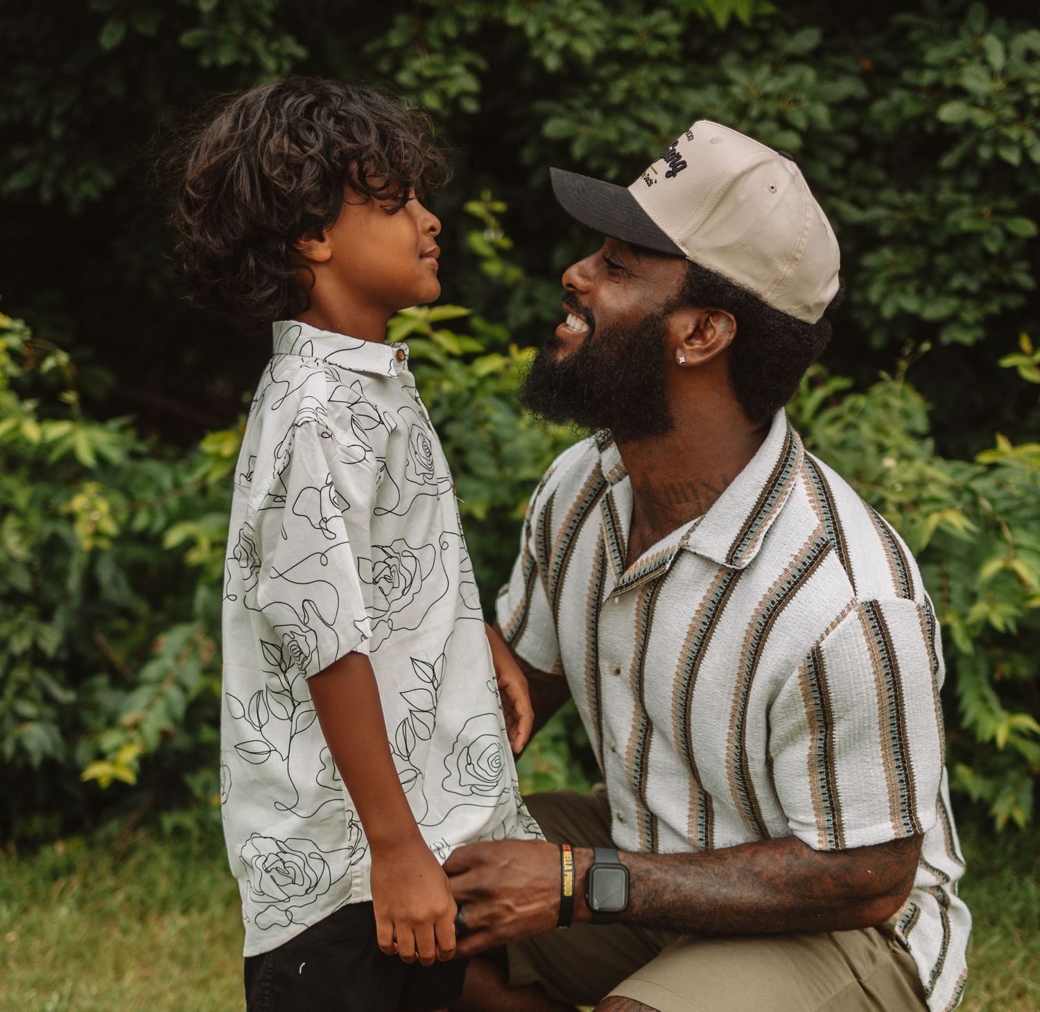A tender parenting moment captured in an outdoor setting with a series of heartfelt interactions.