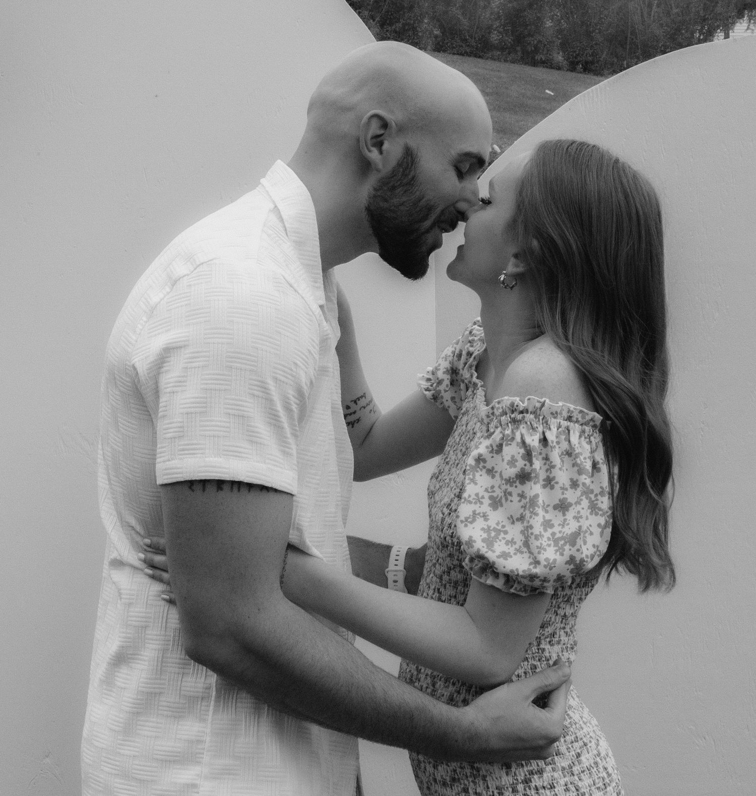 Romantic couple embracing in a tender moment series of black and white photos.